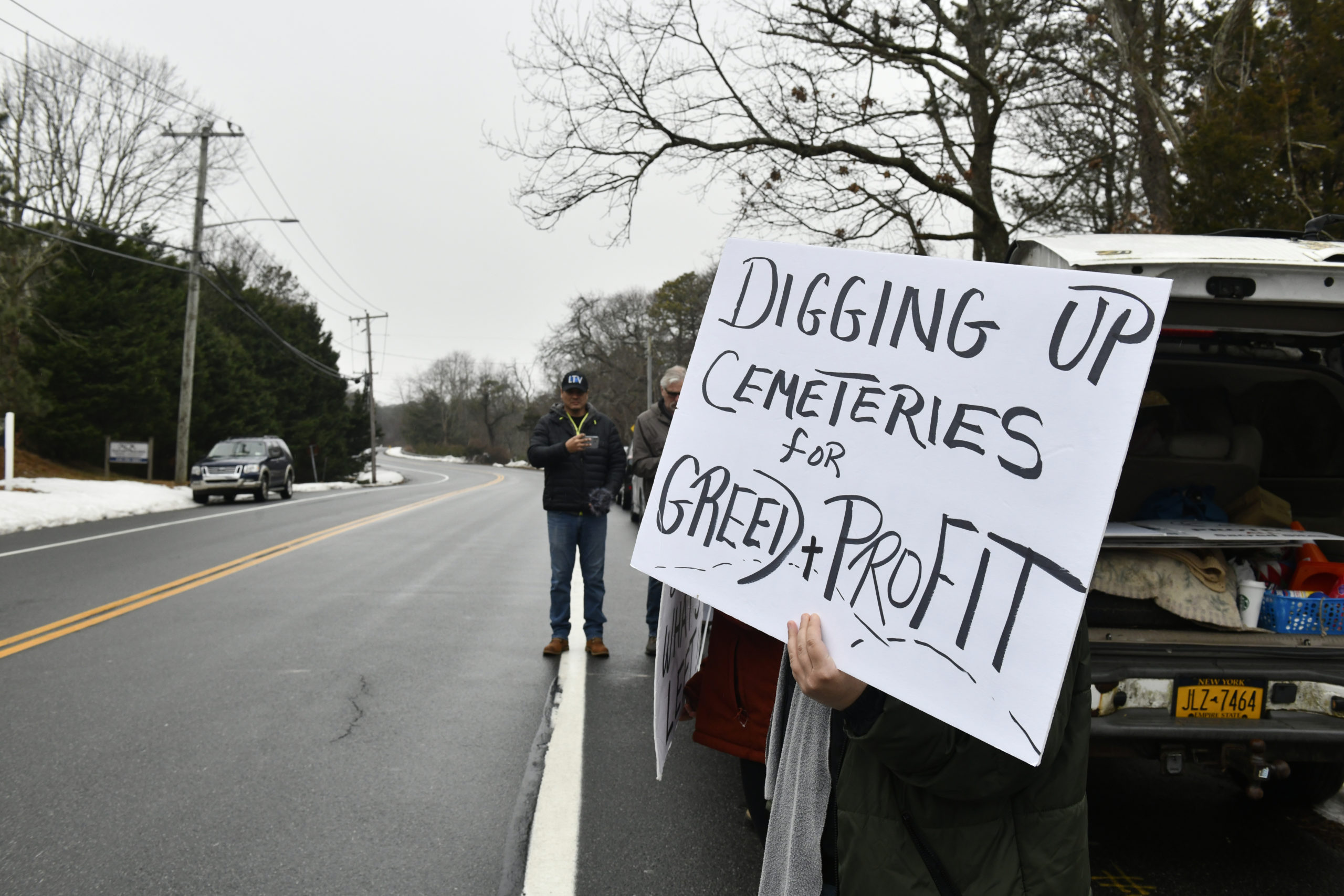 Protestors gathered on Montauk Highway in Shinnecock Hills against Southampton Town's failure to protect sacred land from development on Monday. DANA SHAW