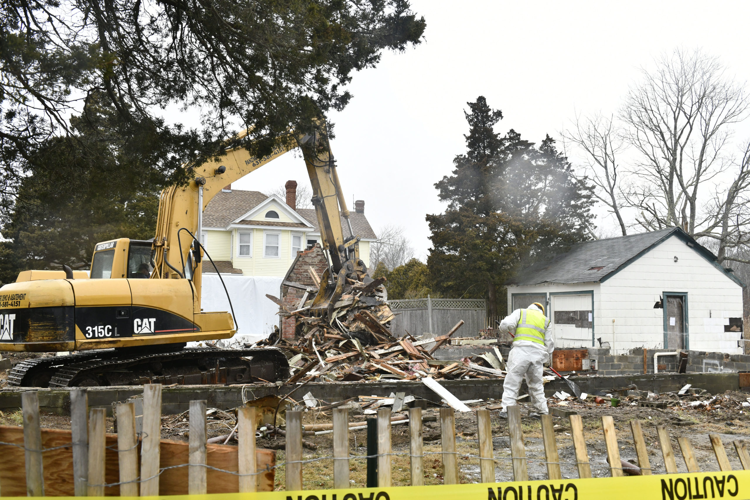 The blighted house at the end of Bay Avenue in East Quogue was demolished on Monday.   DANA SHAW