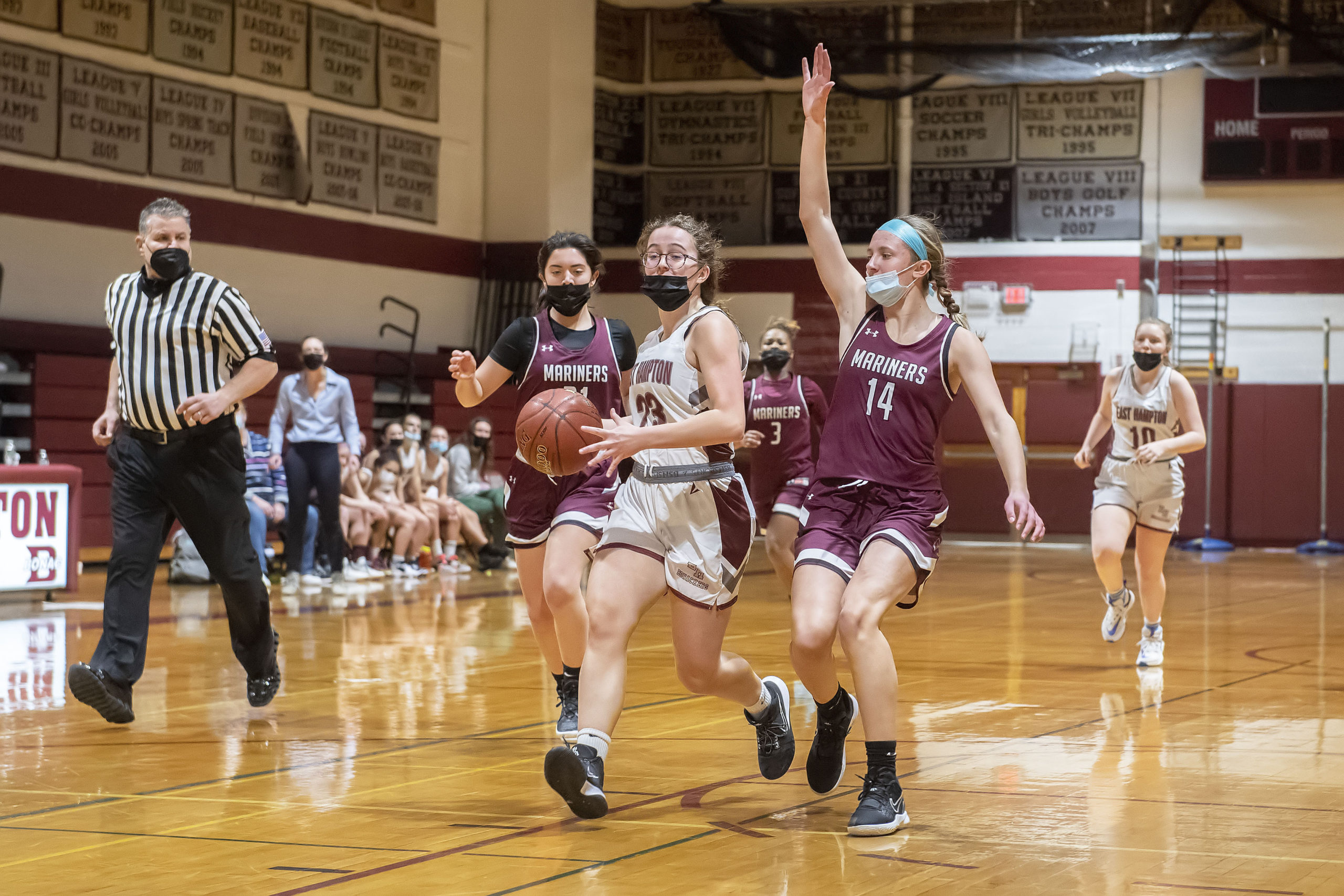 East Hampton's Chloe Swickard is hounded by Juliette Archer.