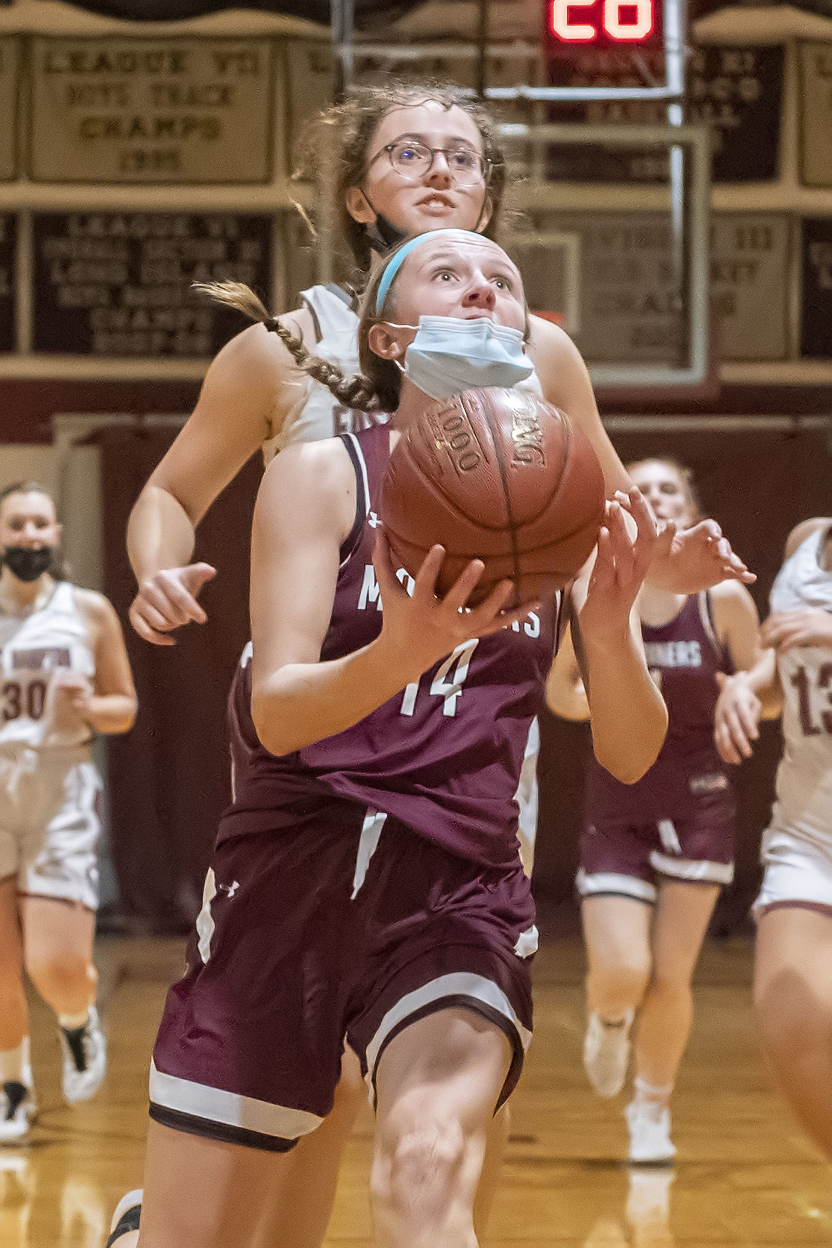 Southampton's Juliette Archer is trailed by East Hampton's Chloe Swickard.