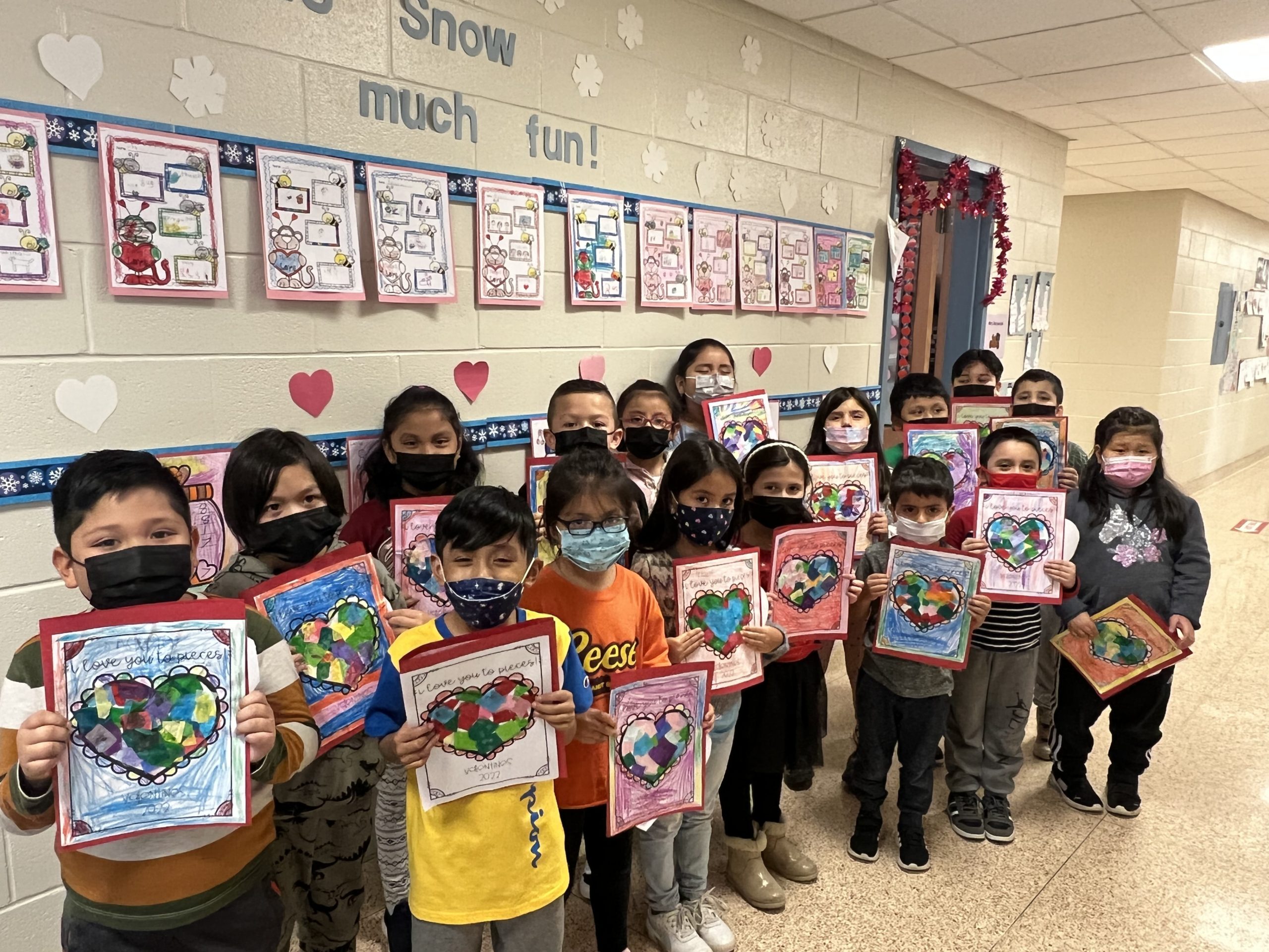 Hampton Bays Elementary School first grade students in Michelle Racywolski’s class recently created drawings with the phrase “I love you to pieces” for their families for Valentine’s Day. Each drawing was adorned with small pieces of paper that students used to form colorful hearts.