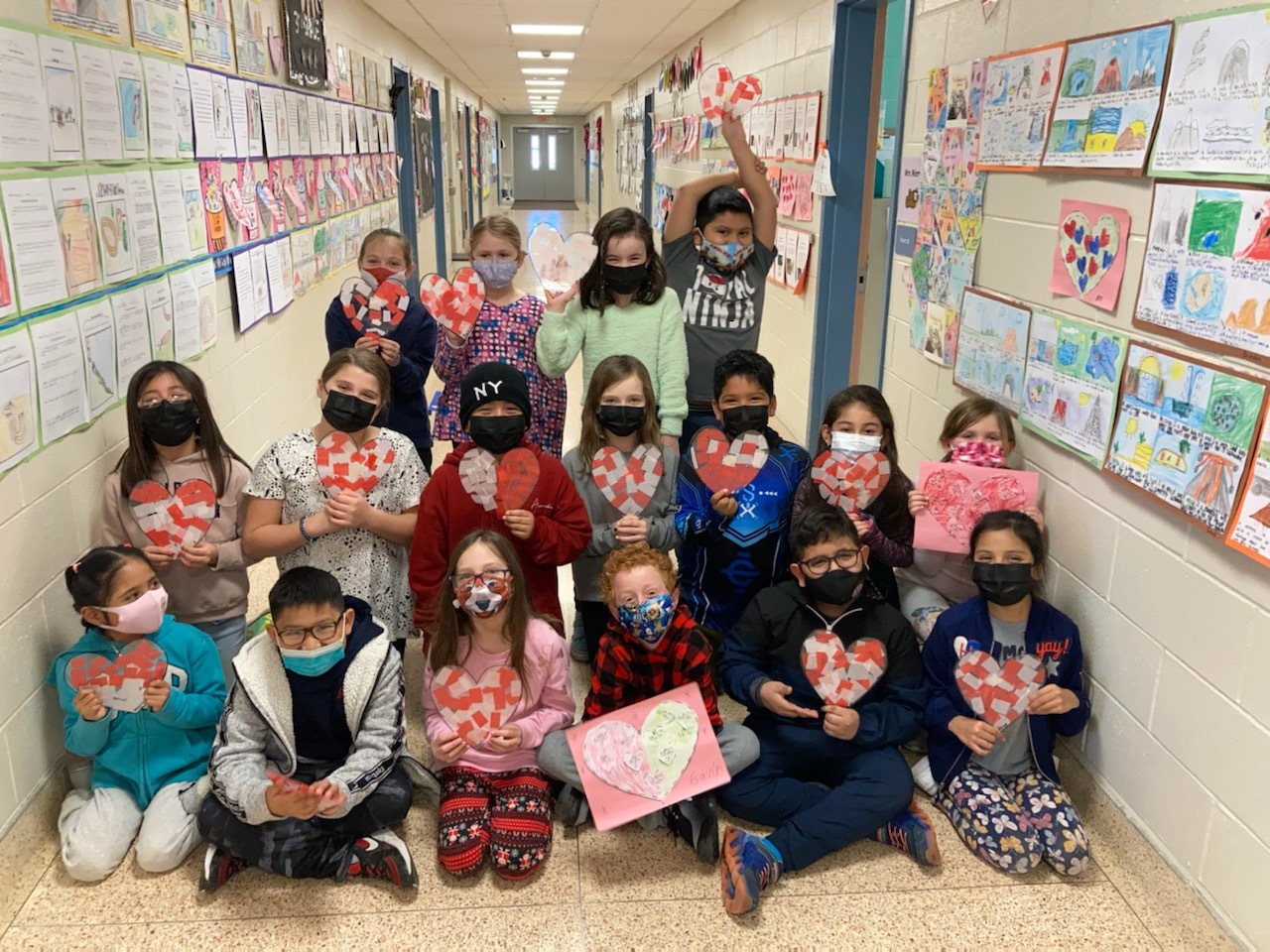 Hampton Bays Elementary School third grade students in Jennifer Warren’s class got into the Valentine’s Day spirit through a hands-on art project. The students used tissue and laminate paper to carefully design their own colorful suncatchers, which now adorn the hallway outside their classroom door.