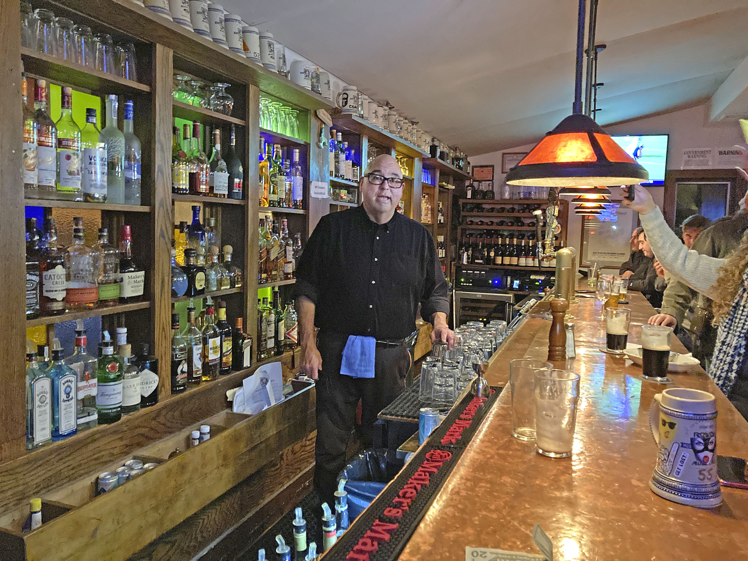 Joe Gonzalez on his last night behind the bar at Rowdy Hall.   KYRIL BROMLEY