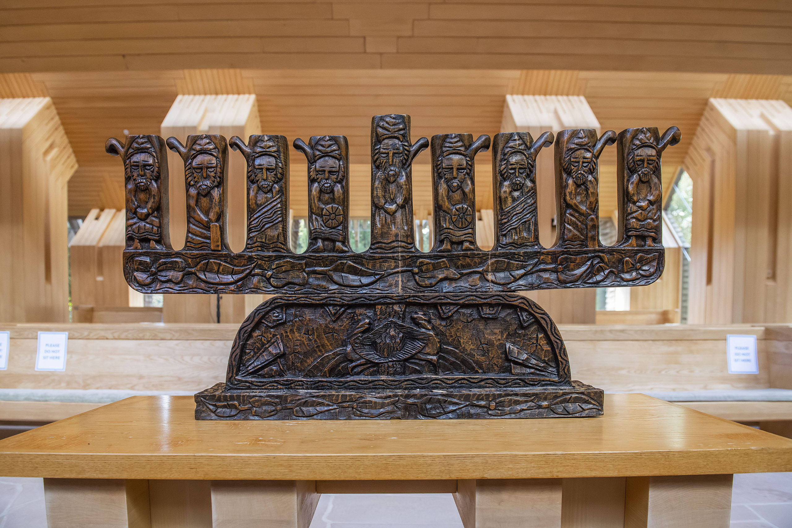 The rear side of an old Moroccan Menorah owned by the Jewish Center of the Hamptons, photographed in the sanctuary on October 18th, 2021