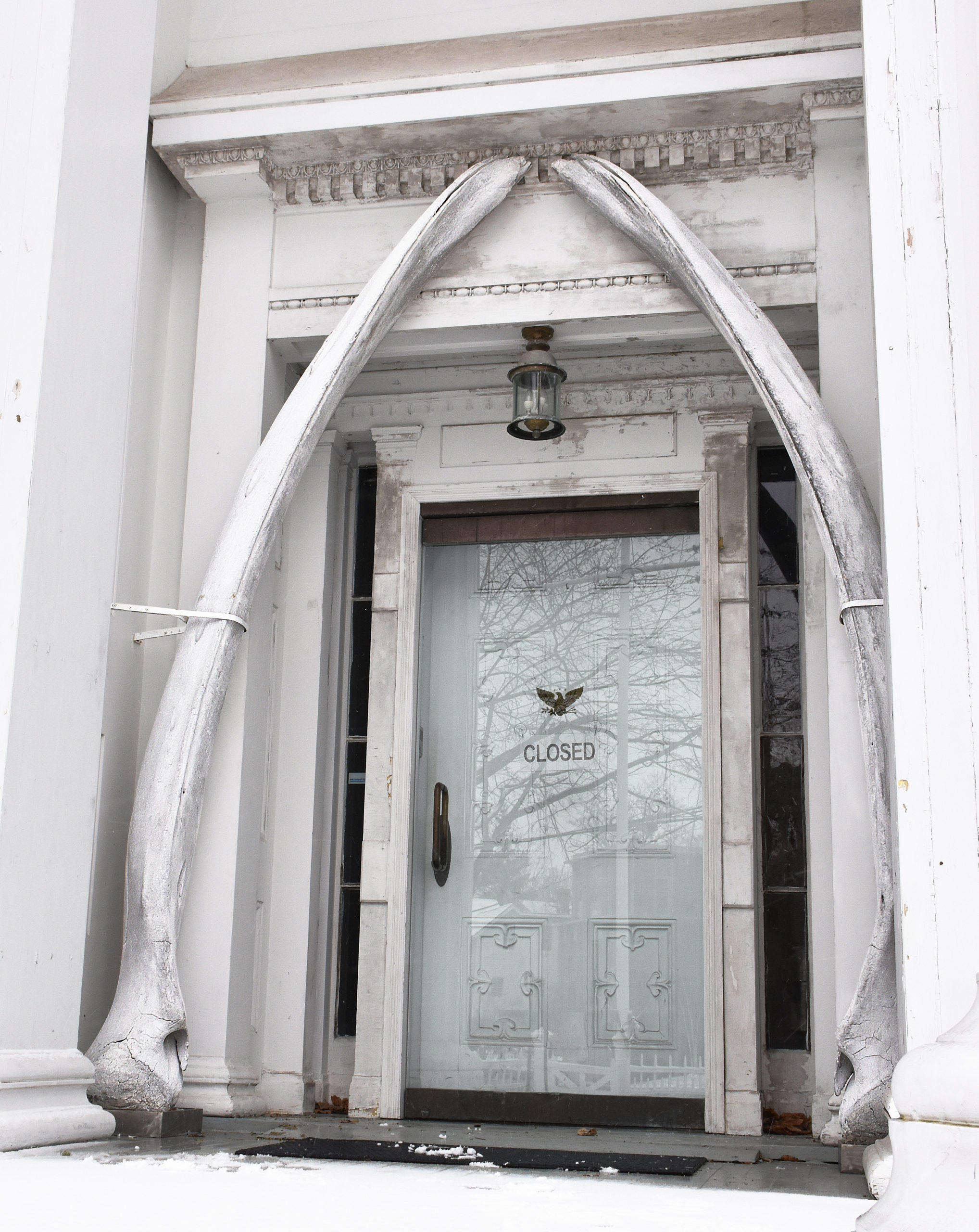 A right whale jaw (baleen) bone that has been incorporated into the entranceway of the Sag Harbor Whaling Museum on the west side of Main Street.  JEAN HELD