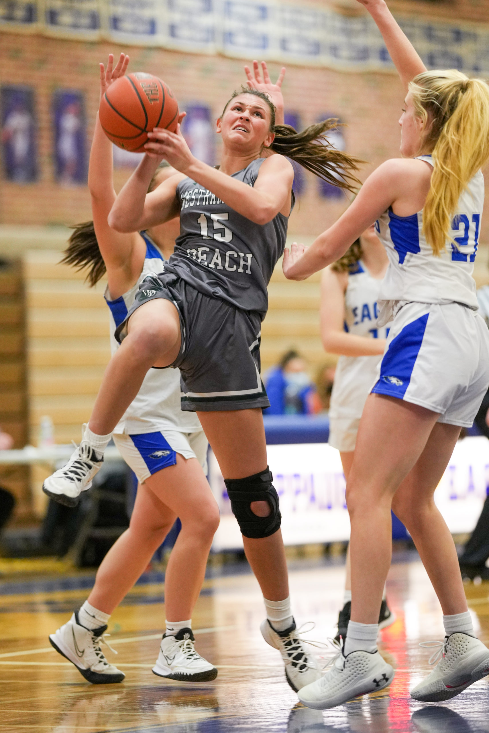 Olivia Rongo jumps toward the basket. RON ESPOSITO