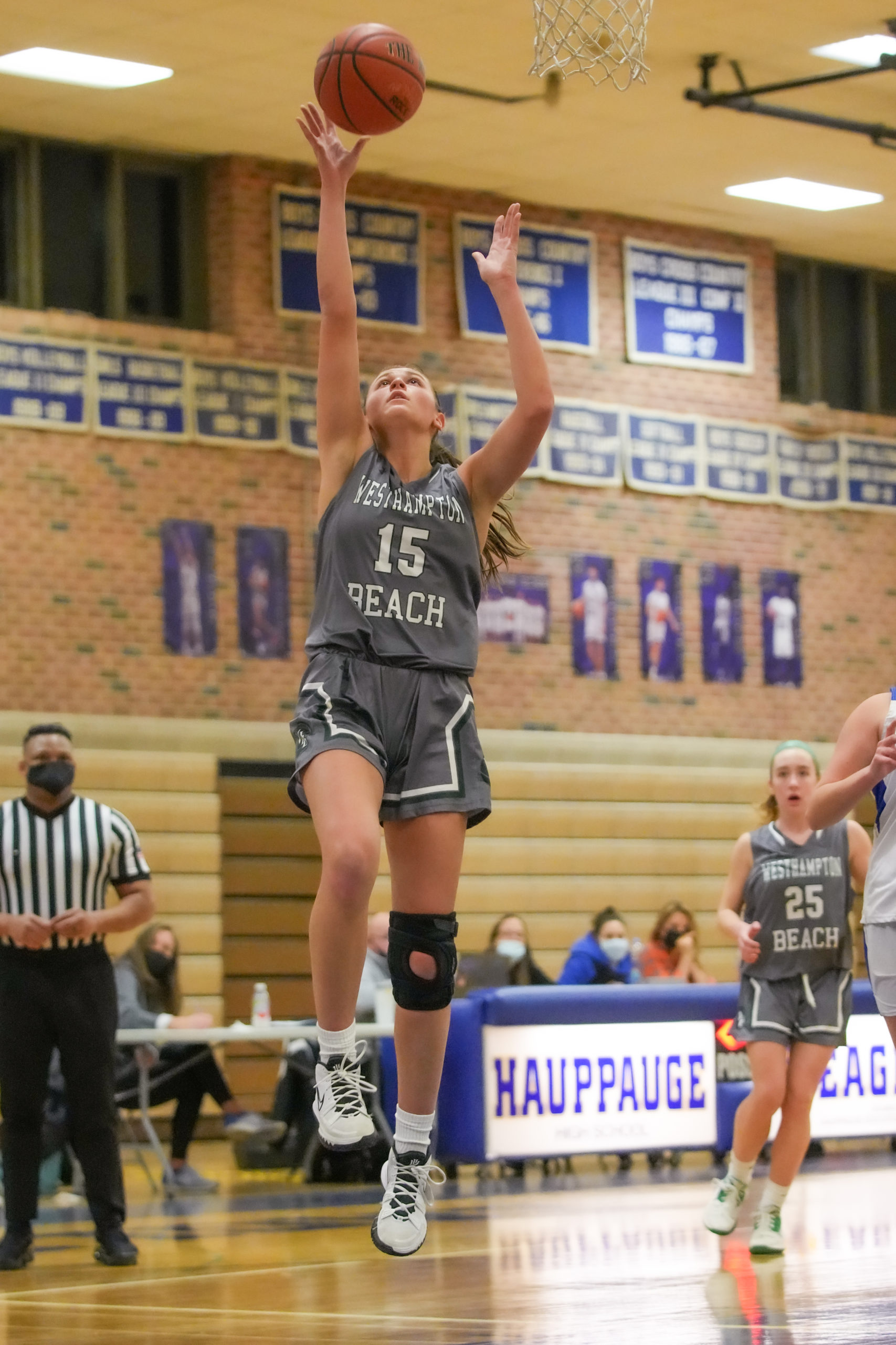 Olivia Rongo leaps for a layup. RON ESPOSITO