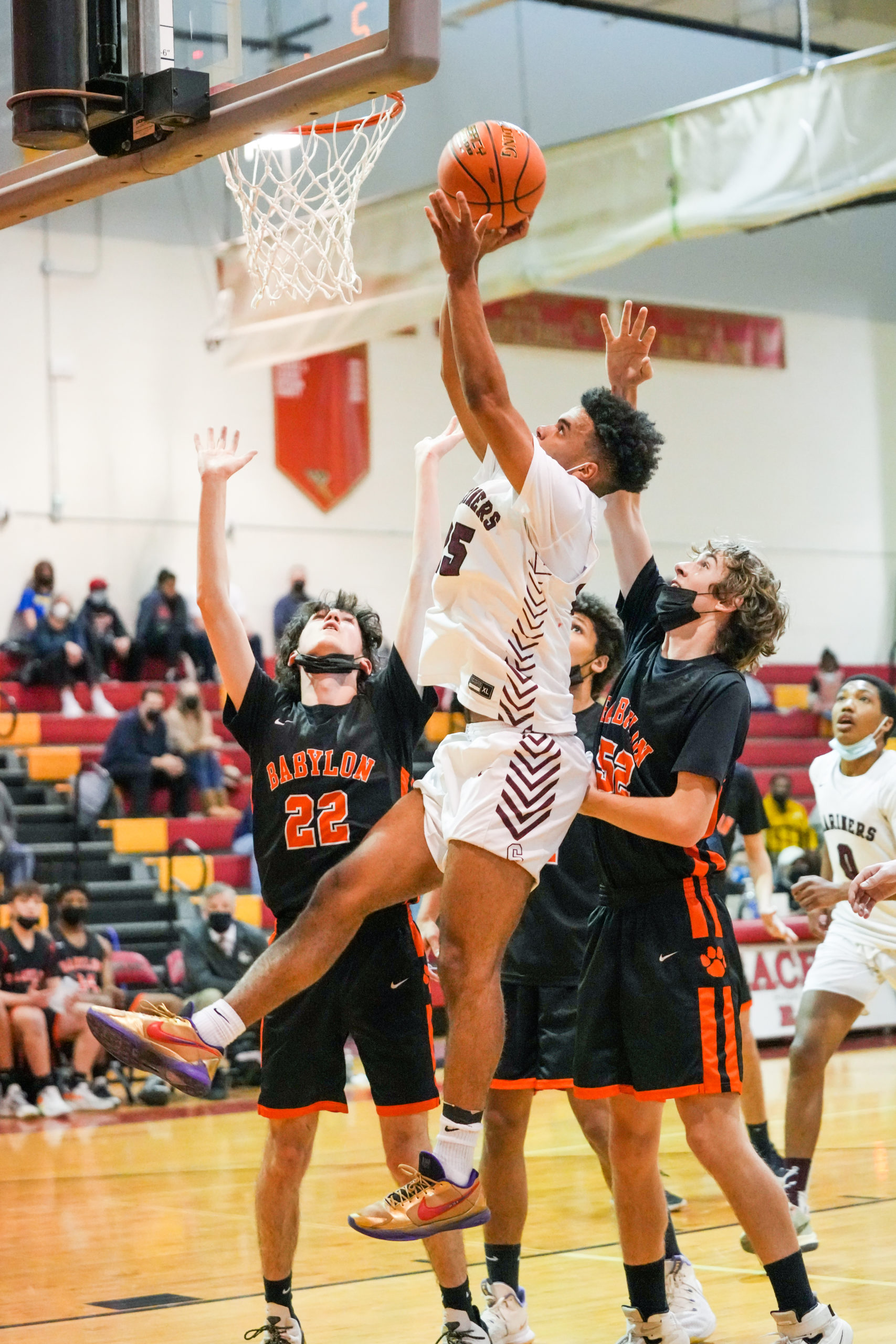 Southampton senior co-captain LeBron Napier goes up for two of his game-high 30 points.