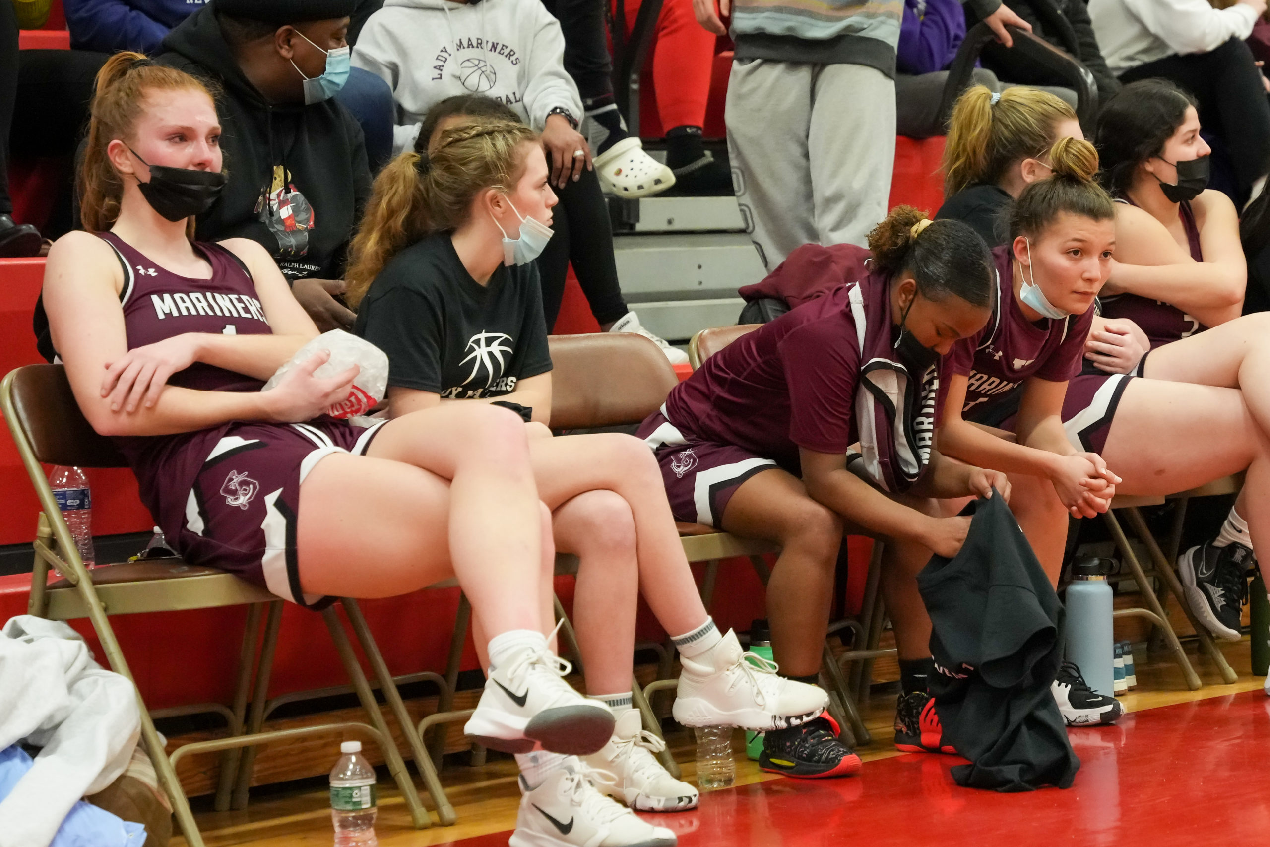 The Mariners look on dejectedly in the waning minutes of last week's 58-30 loss at Center Moriches in the Suffolk County Class B semifinals.  RON ESPOSITO