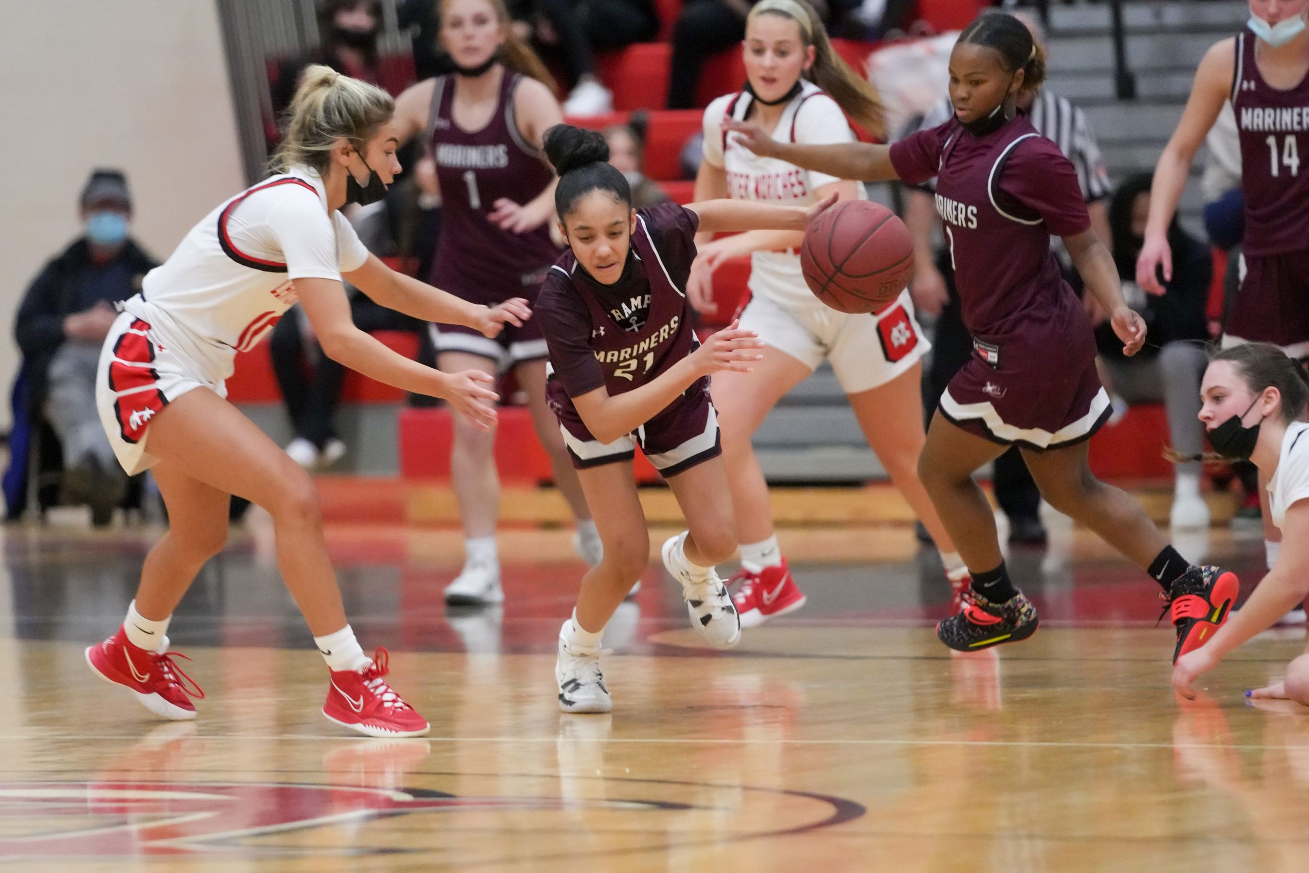 Southampton freshman Daelyn Palmore drives on Charlotte Castiglione of Center Moriches.