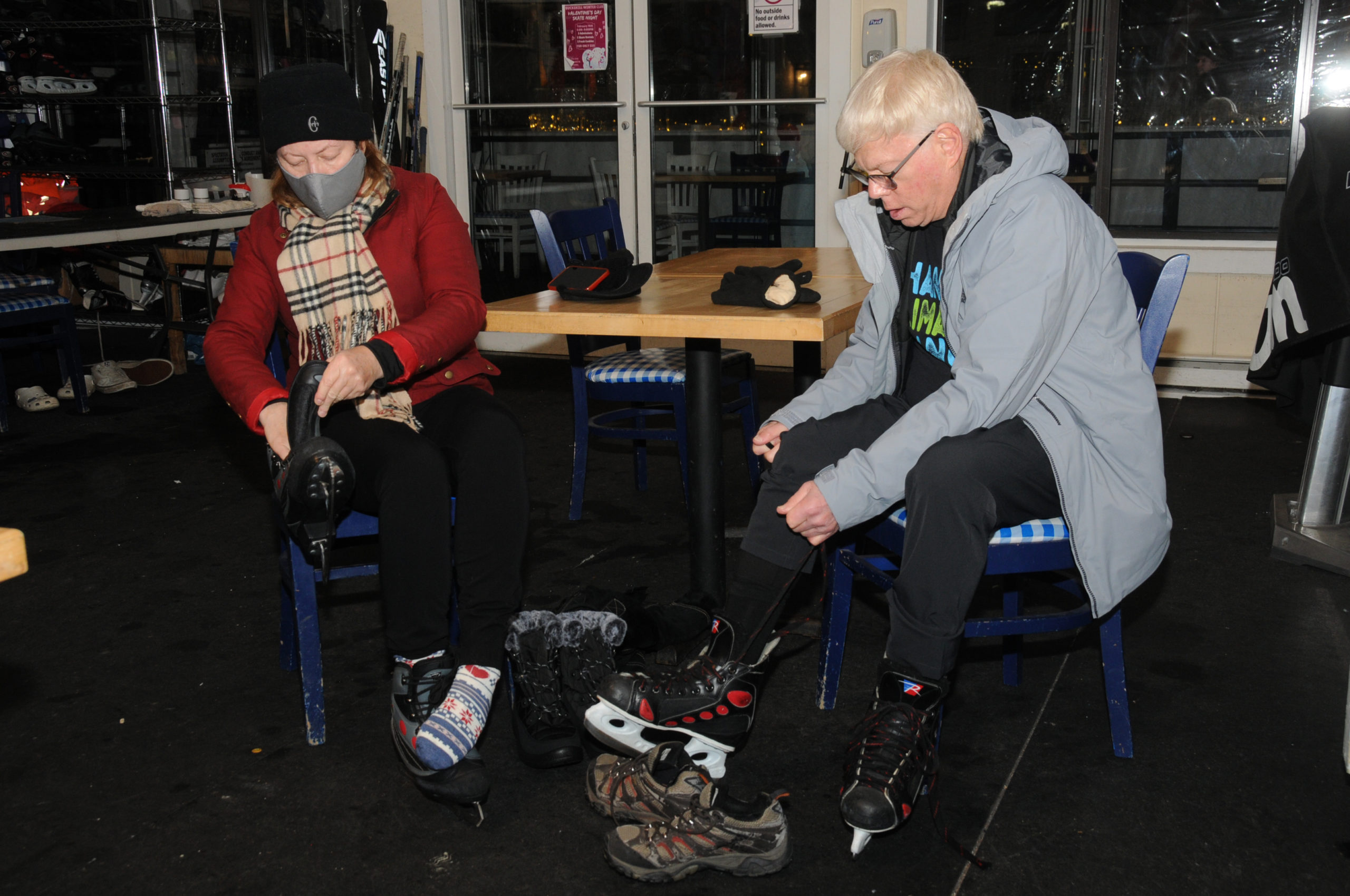 Cindy Rosenthal and Allen Norin lace up their skates at the Bay Street Theater's 