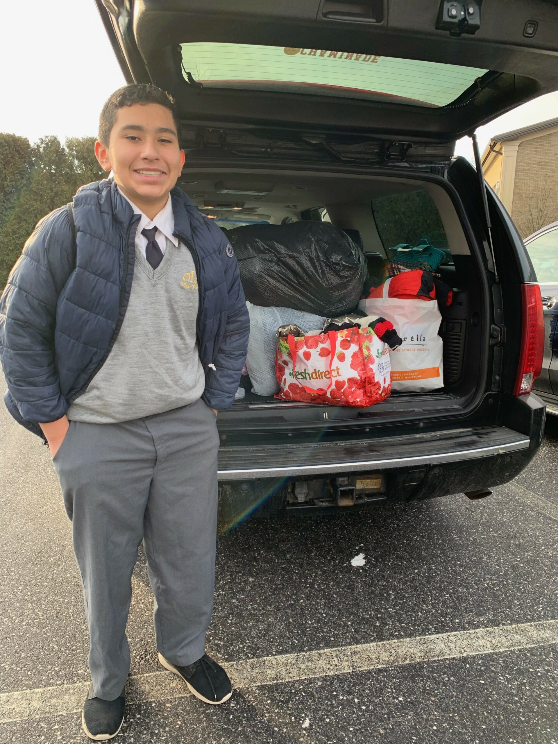 In a spirit of giving and compassion, the Prep 8 class, including Allan Rivera, delivered coats to the Heart of the Hamptons at Our Lady of the Hamptons School sponsored a winter coat drive to benefit the clothing banks at parishes in Southampton and Hampton Bays. This was coupled to the campaign to provide supplies for the North Fork Animal Shelter spearheaded by Prep 6.