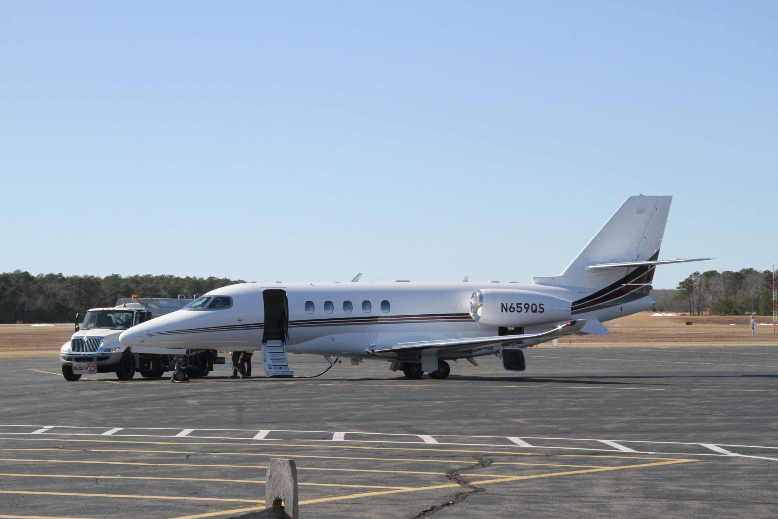 A midsized private jet refueling at East Hampton Airport on a recent Friday afternoon.