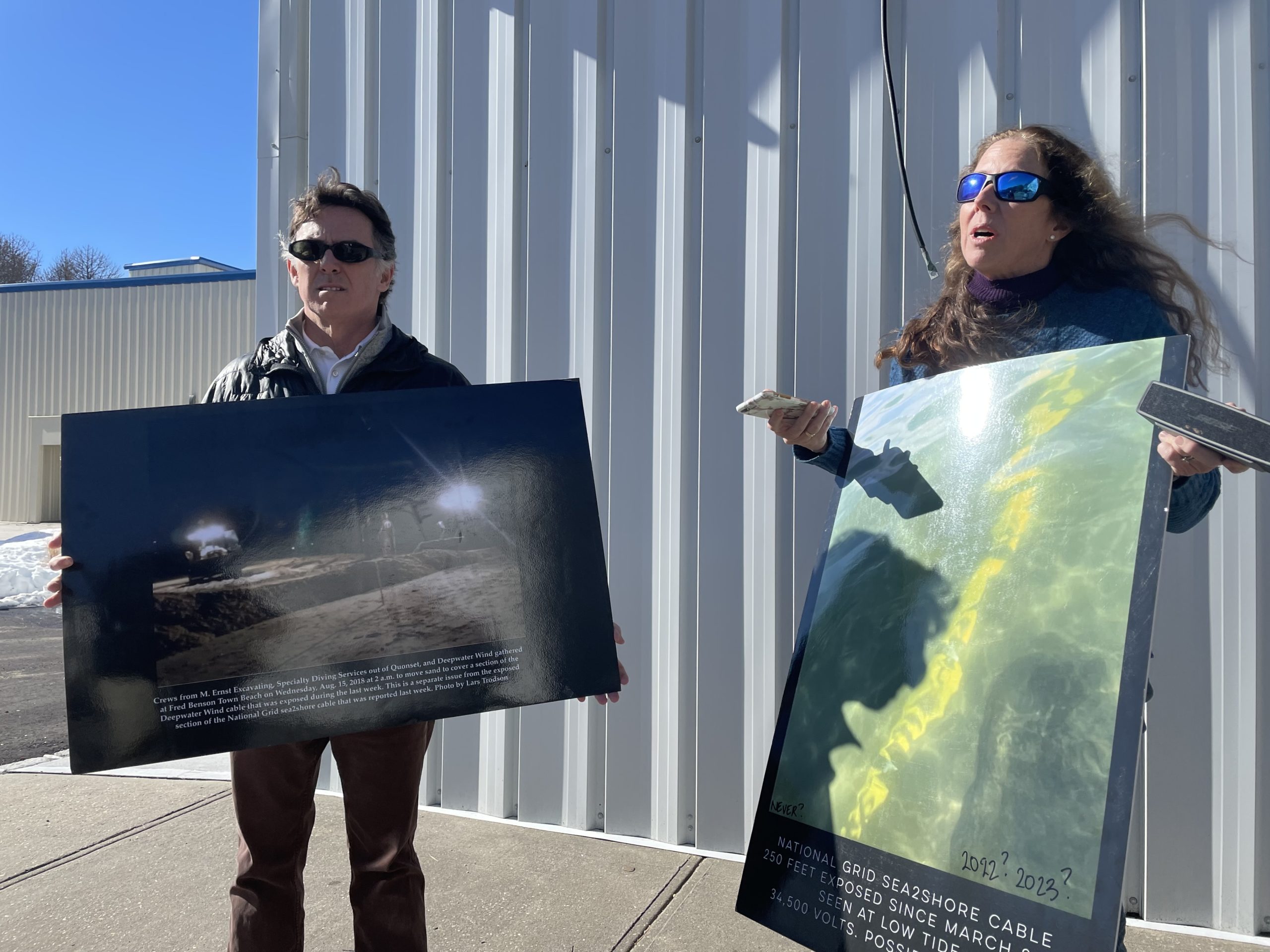 Bonnie Brady, right, the director of the Long Island Commercial Fishing Association, protested outside LTV's studios on Friday while Governor Kathy Hochul and U.S. Department of Interior Secretary Deb Haaland led the ceremonial groundbreaking for the South Fork Wind project inside.