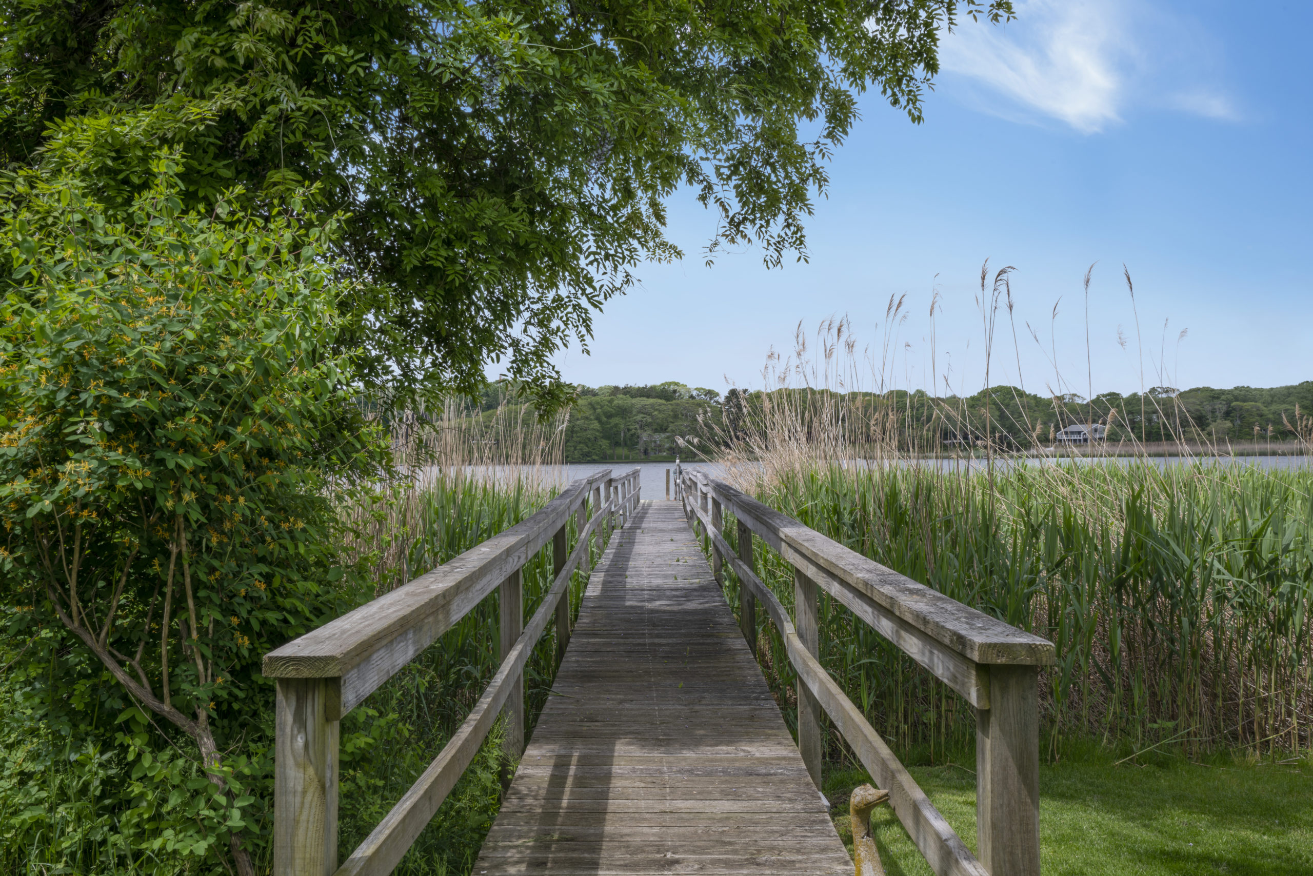 The private dock at 140 Hayground Cove Road in Water Mill. BESPOKE REAL ESTATE