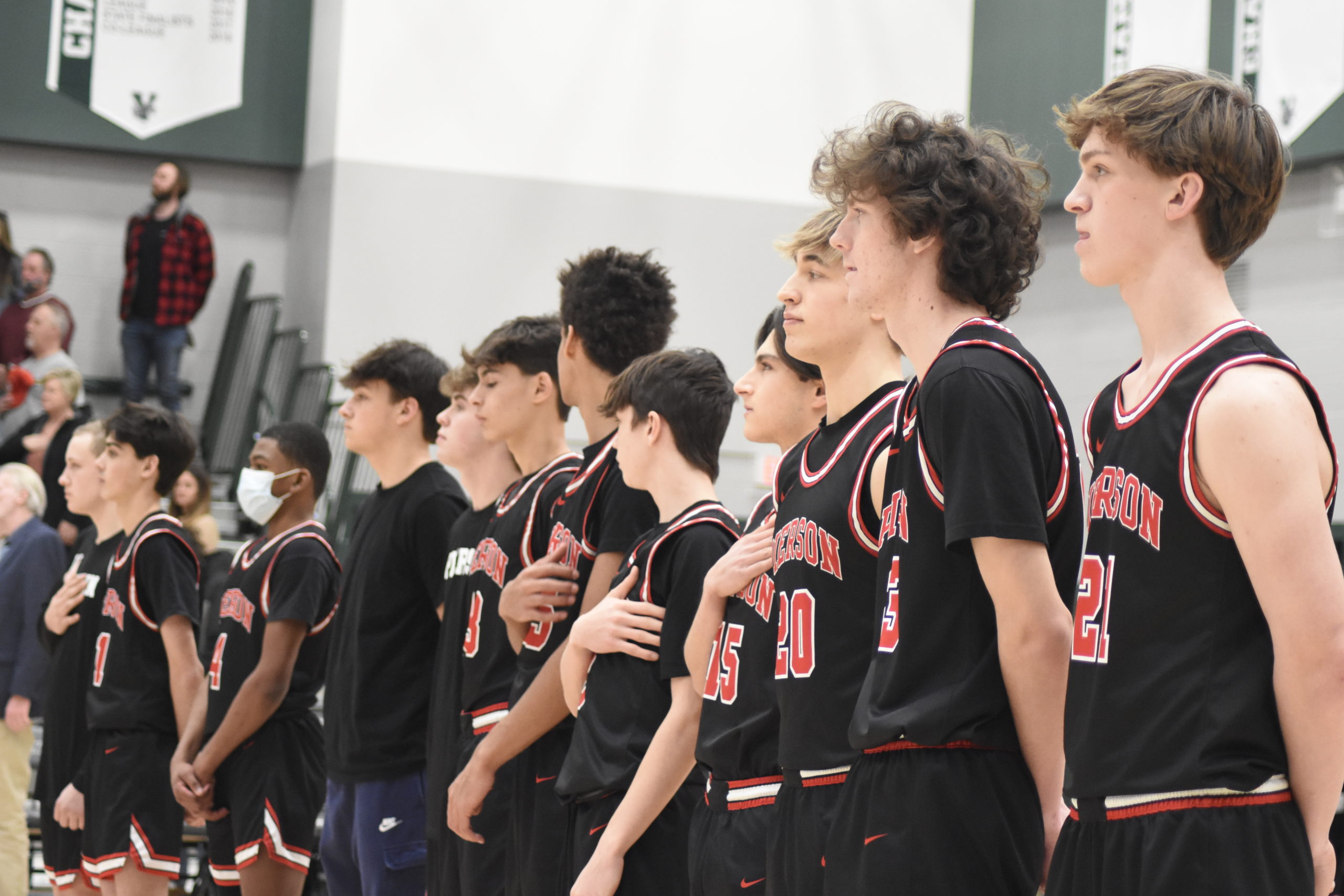 The Whalers during the Star-Spangled Banner just prior to tip-off of Sunday's Class C Regional Final at Yorktown High School.    DREW BUDD