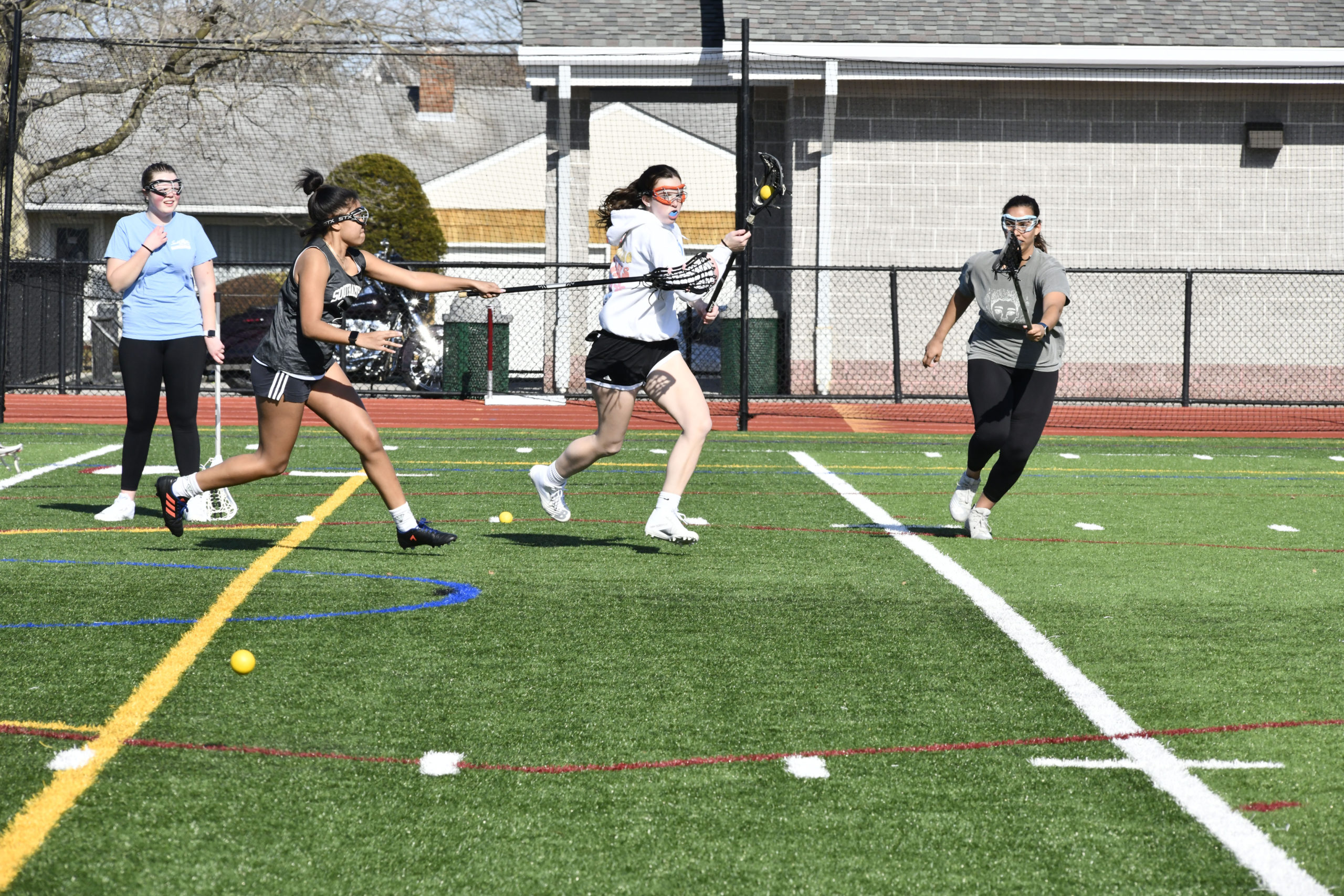 Members of the Southampton girls lacrosse team practice on Monday. DANA SHAW