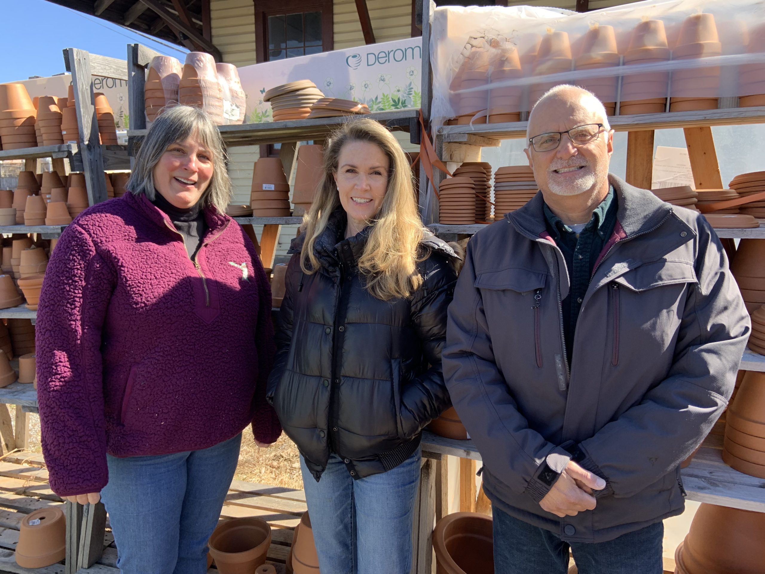 Linnette Roe, center, has purchased the Sag Harbor Garden Center from Diane and Phil Bucking. STEPHEN J. KOTZ