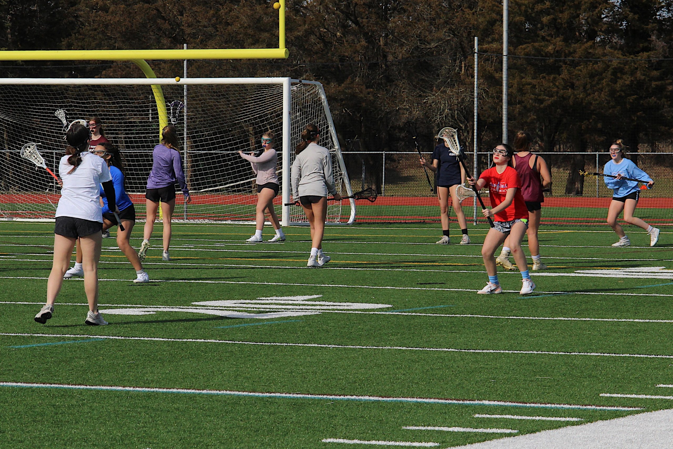 The East Hampton/Pierson/Bridgehampton/Ross girls lacrosse team during one of the first official days of the spring season last week.    KYRIL BROMLEY