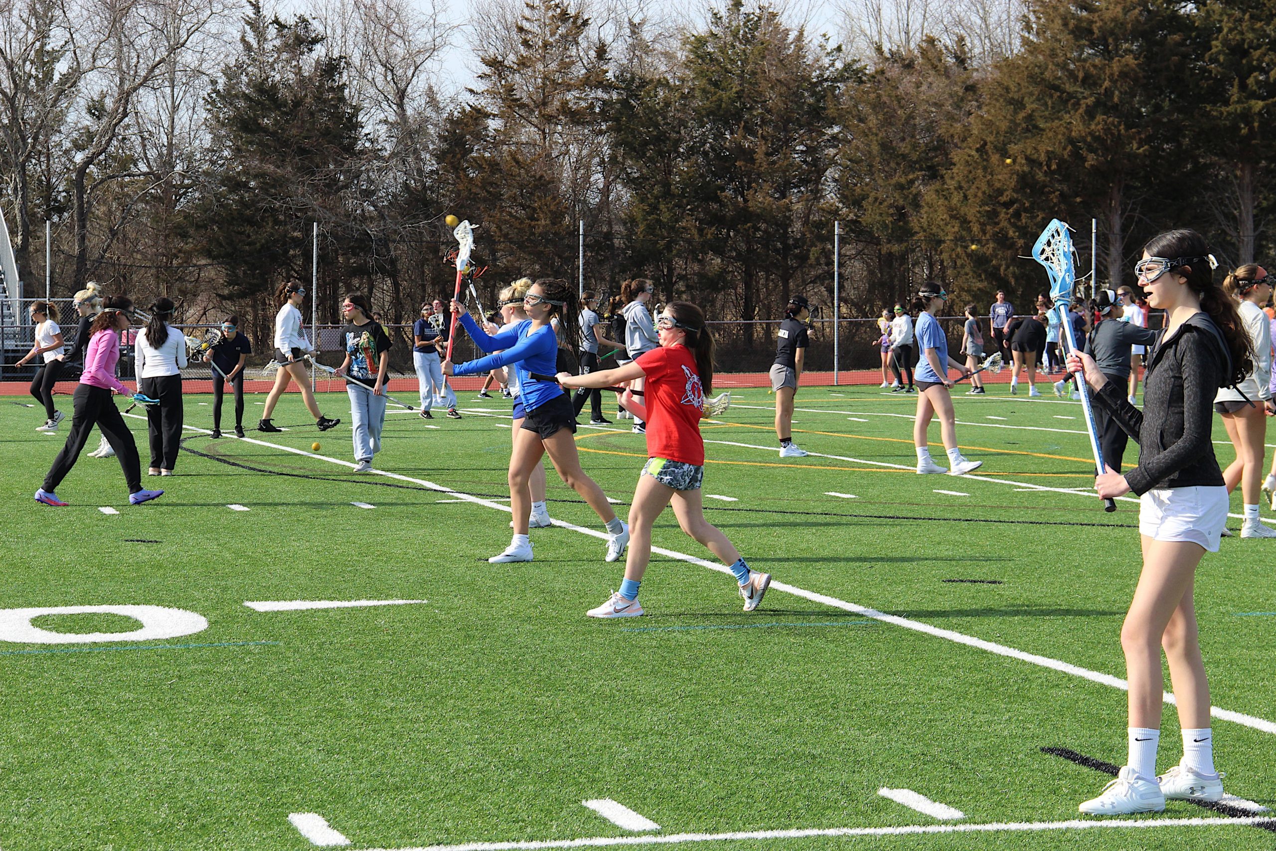 The East Hampton/Pierson/Bridgehampton/Ross girls lacrosse team during one of the first official days of the spring season last week.    KYRIL BROMLEY