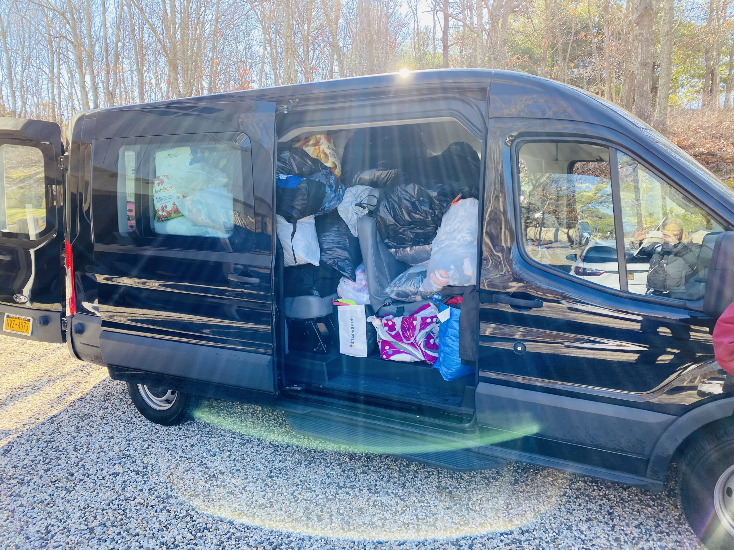 A van full of donations, bound for Ukraine, after Natalie Massa organized a volunteer effort from her home in Water Mill.