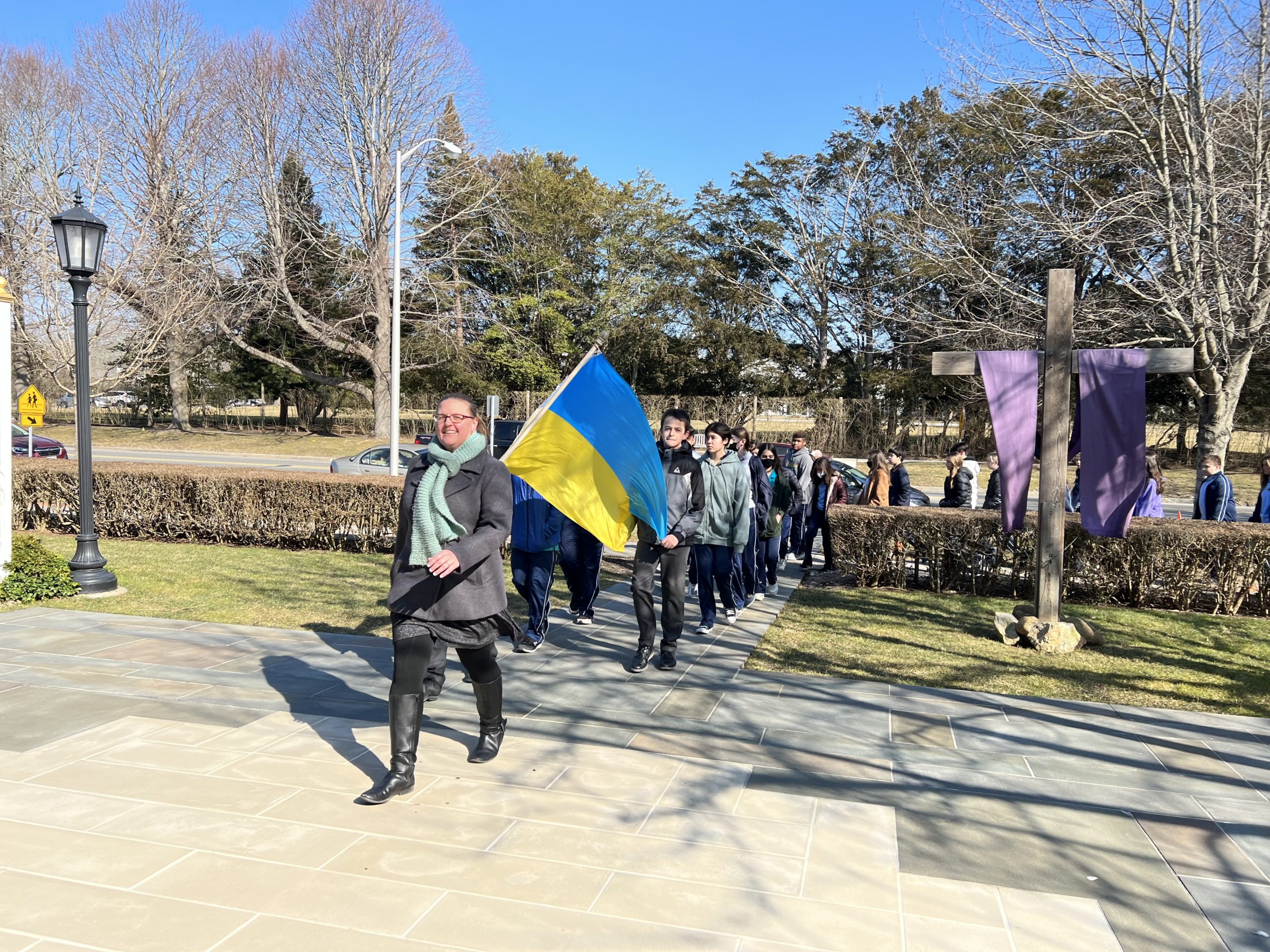Our Lady of the Hamptons School Prep students participated in a peace procession in support of the people of Ukraine, marching to the Basilica on Ash Wednesday.