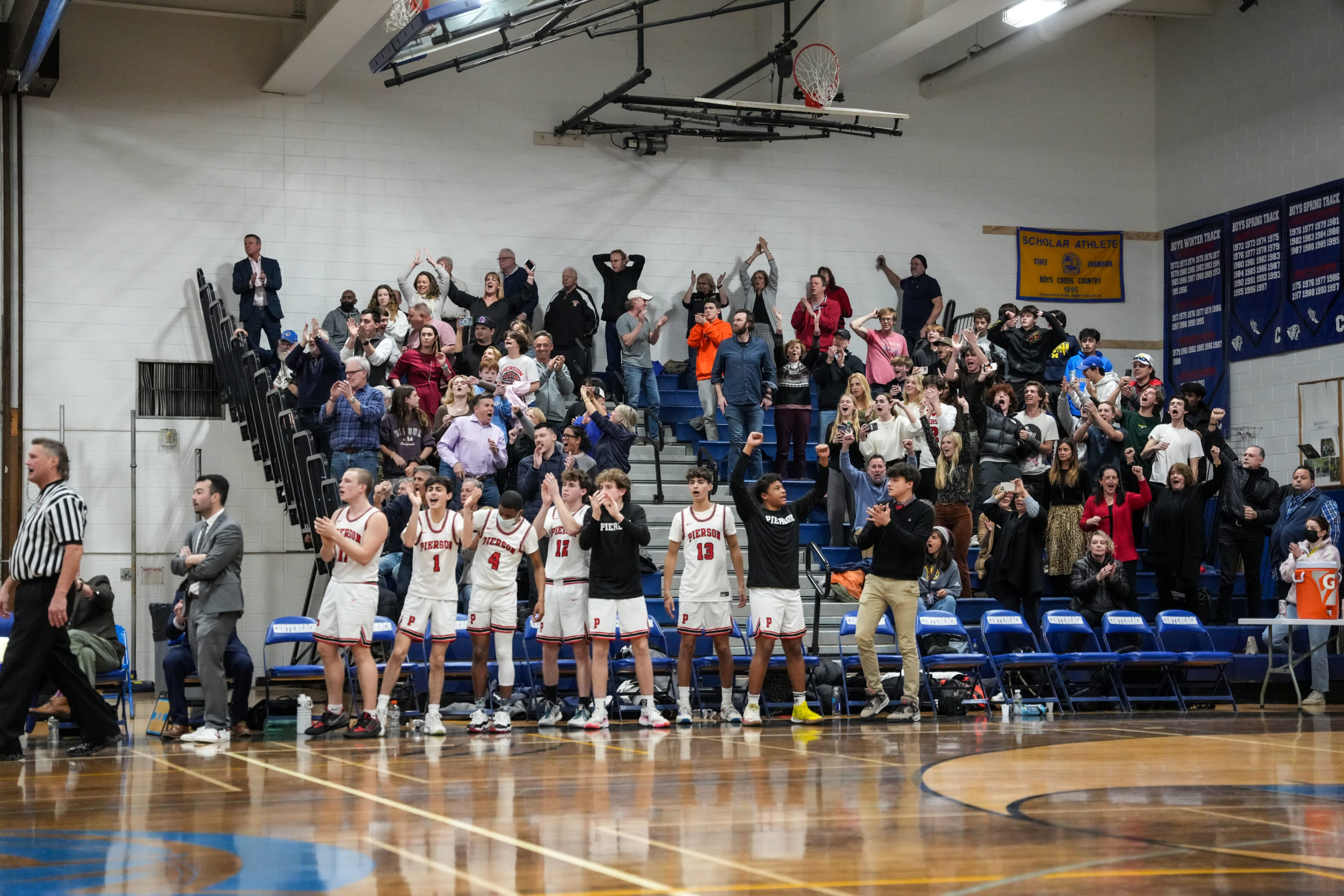 Pierson players and the crowd react to the boys basketball team's victory on Wednesday.   RON ESPOSITO