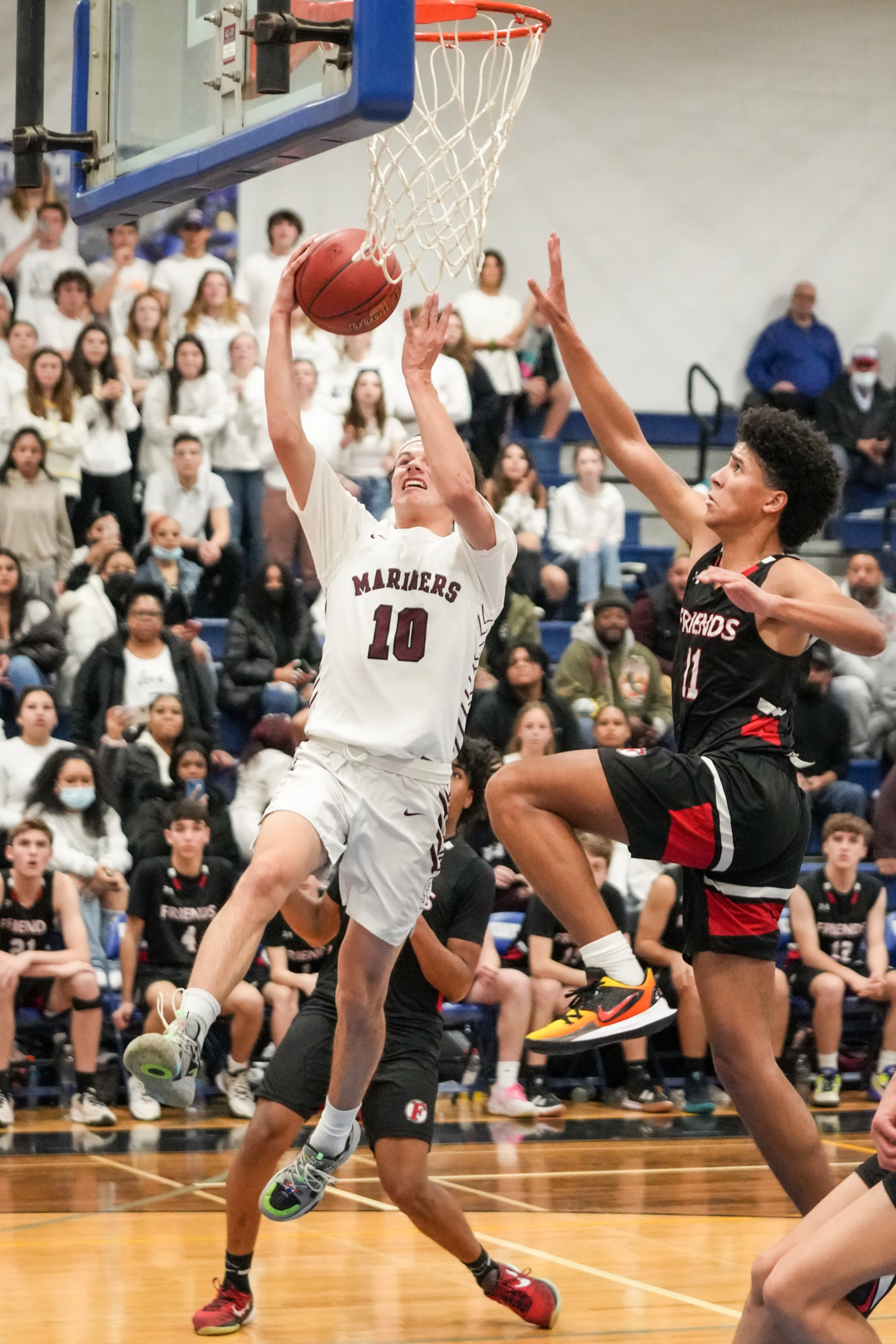 Southampton senior co-captain Andrew Venesina goes hard to the basket.   RON ESPOSITO