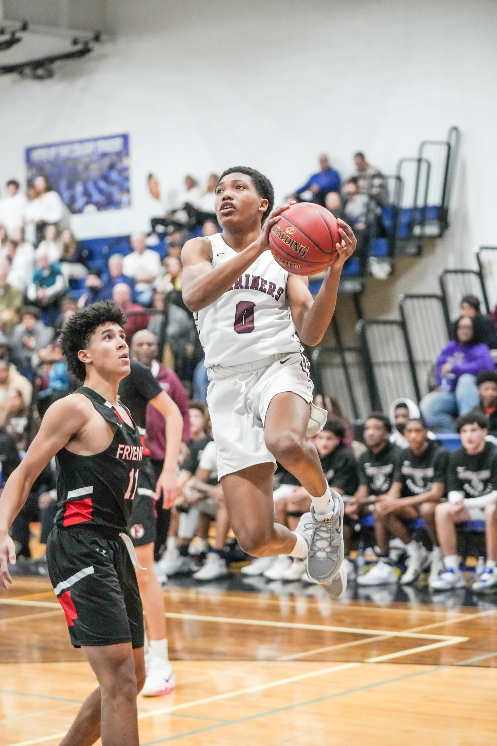 Southampton freshman Naevon Jenkins soars toward the basket.    RON ESPOSITO