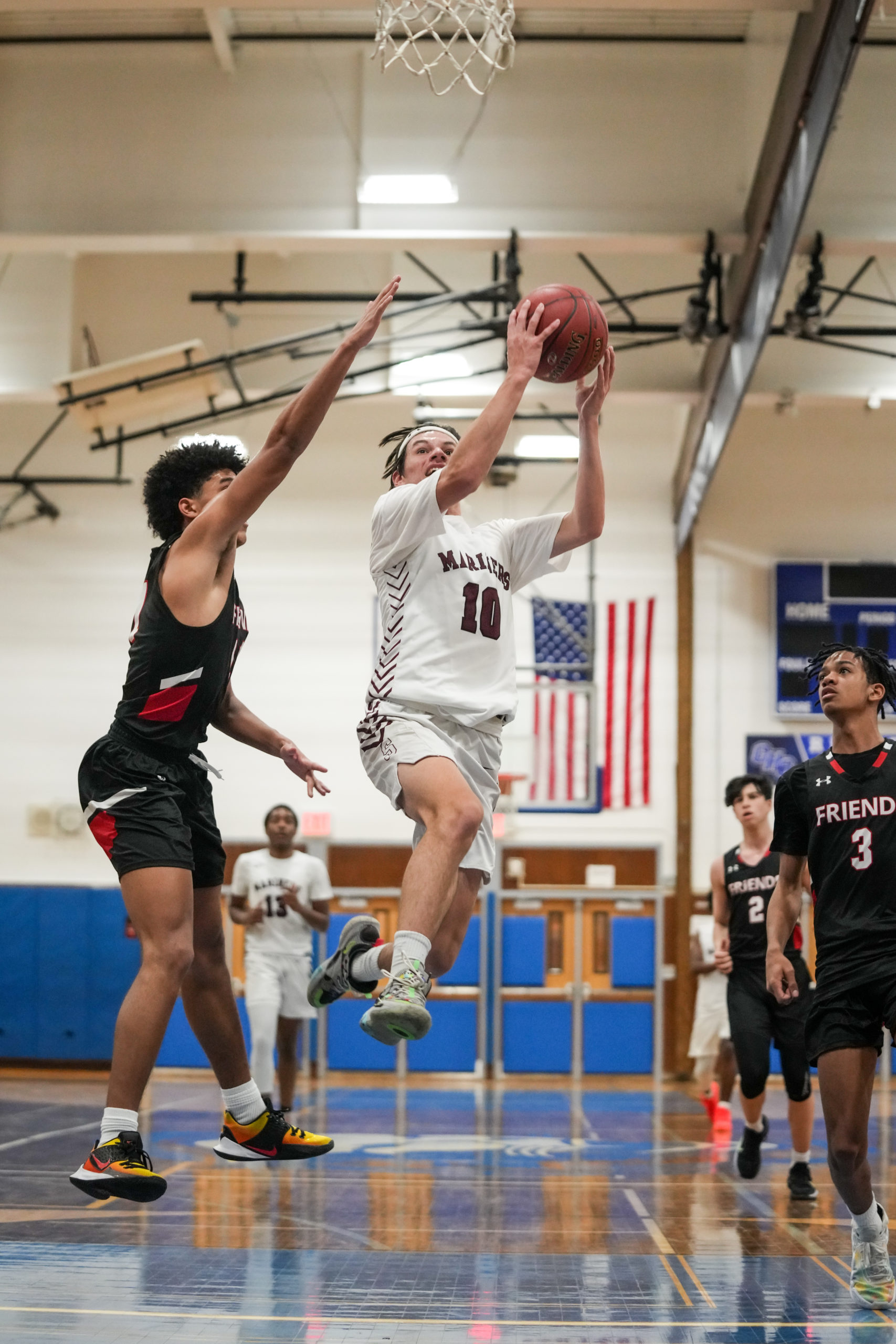 Southampton's Andrew Venesina drives to the basket.   RON ESPOSITO