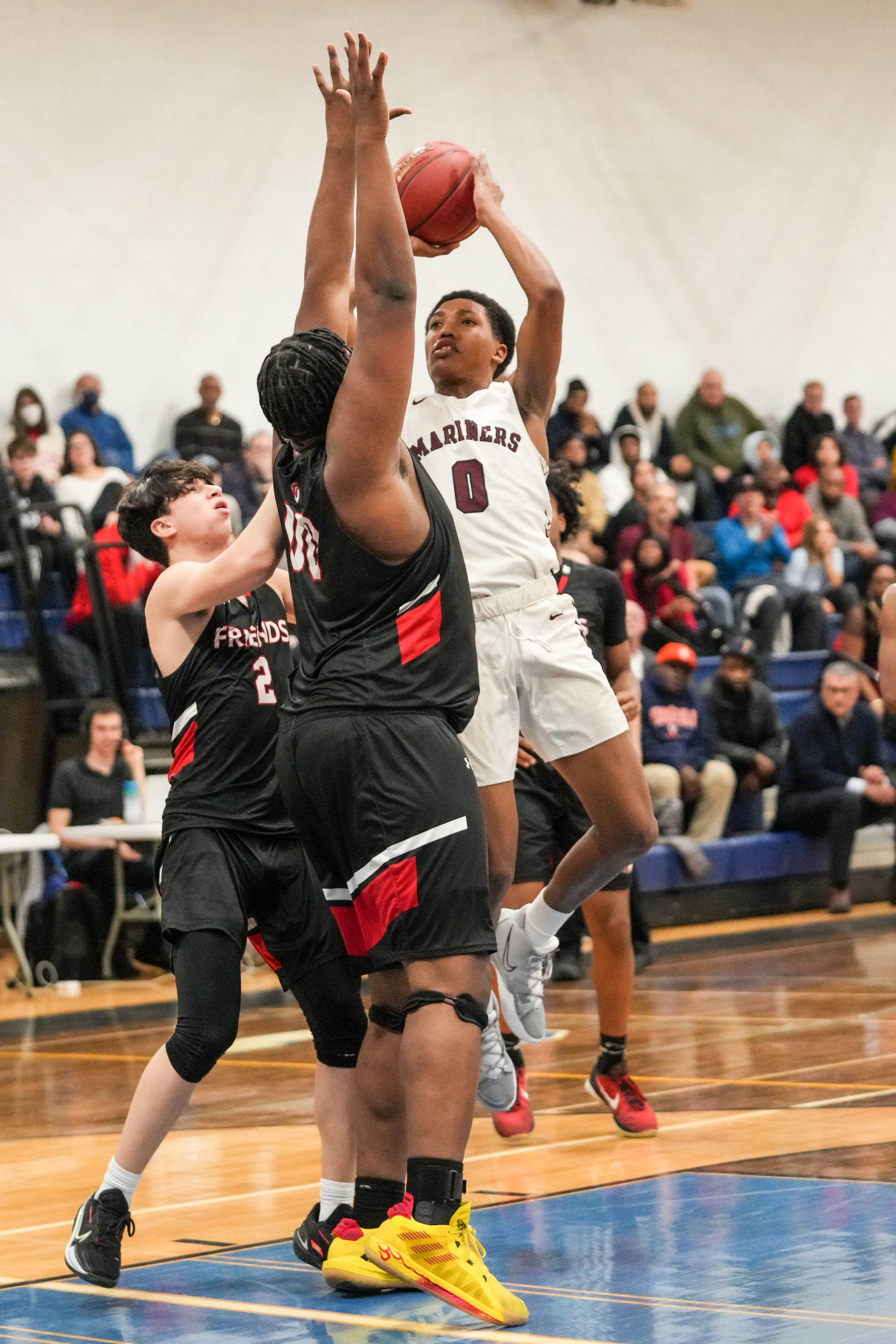 Southampton freshman Naevon Jenkins takes on both C.J. Williams and Gabe Ferenez.    RON ESPOSITO