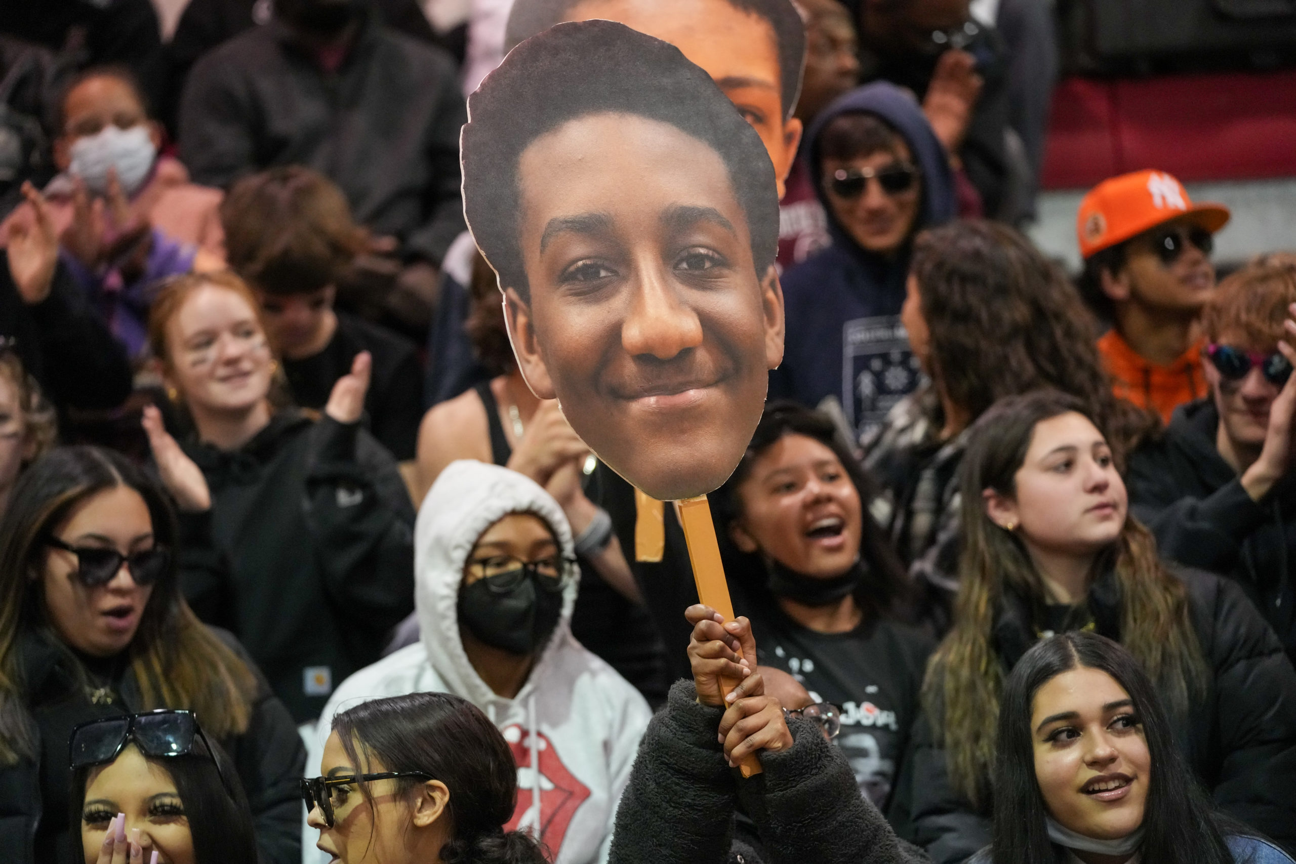 A fan holds up a Kellen Jeffries Fathead.    RON ESPOSITO