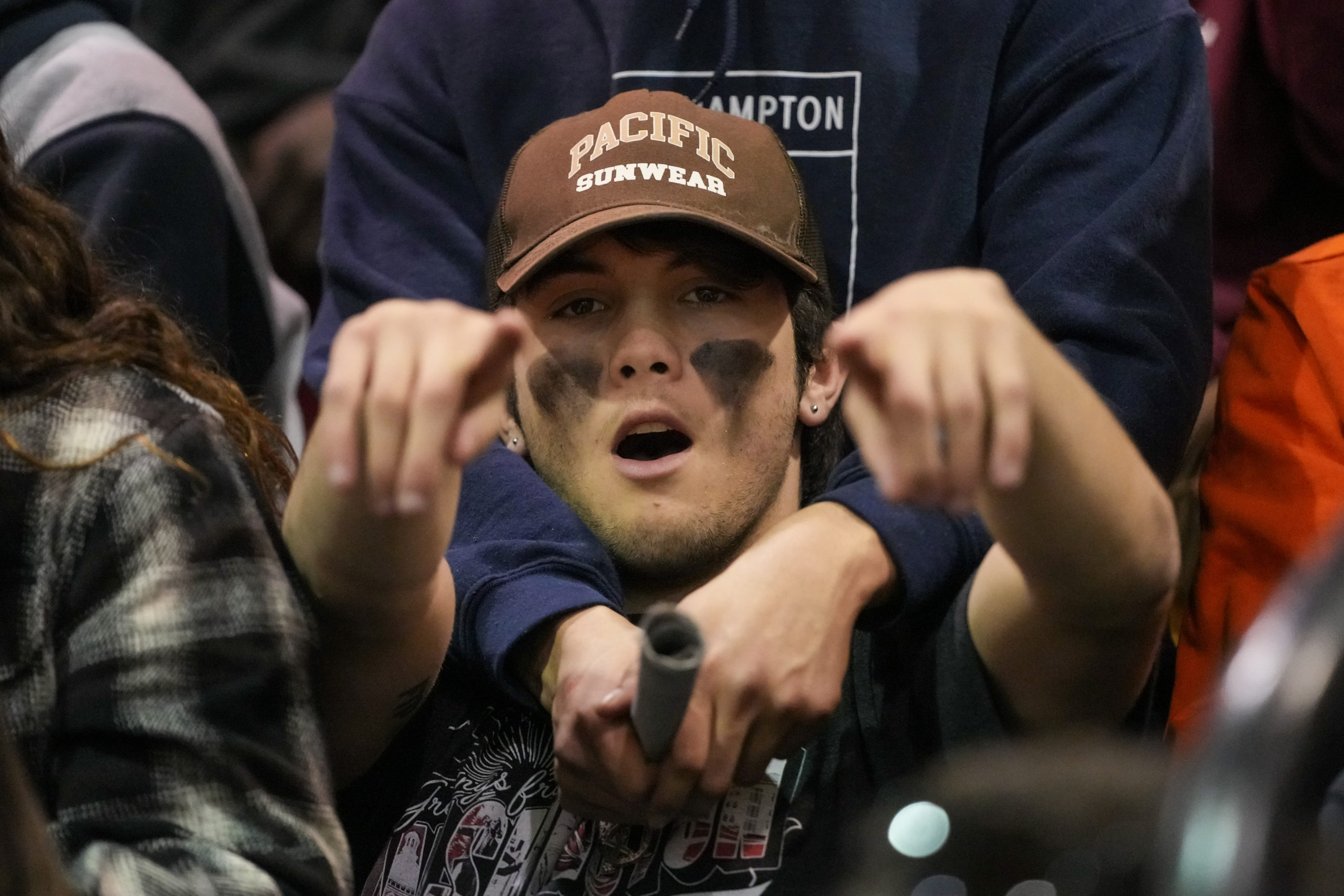 Alex Boyd takes in the game at Sachem East High School.   RON ESPOSITO