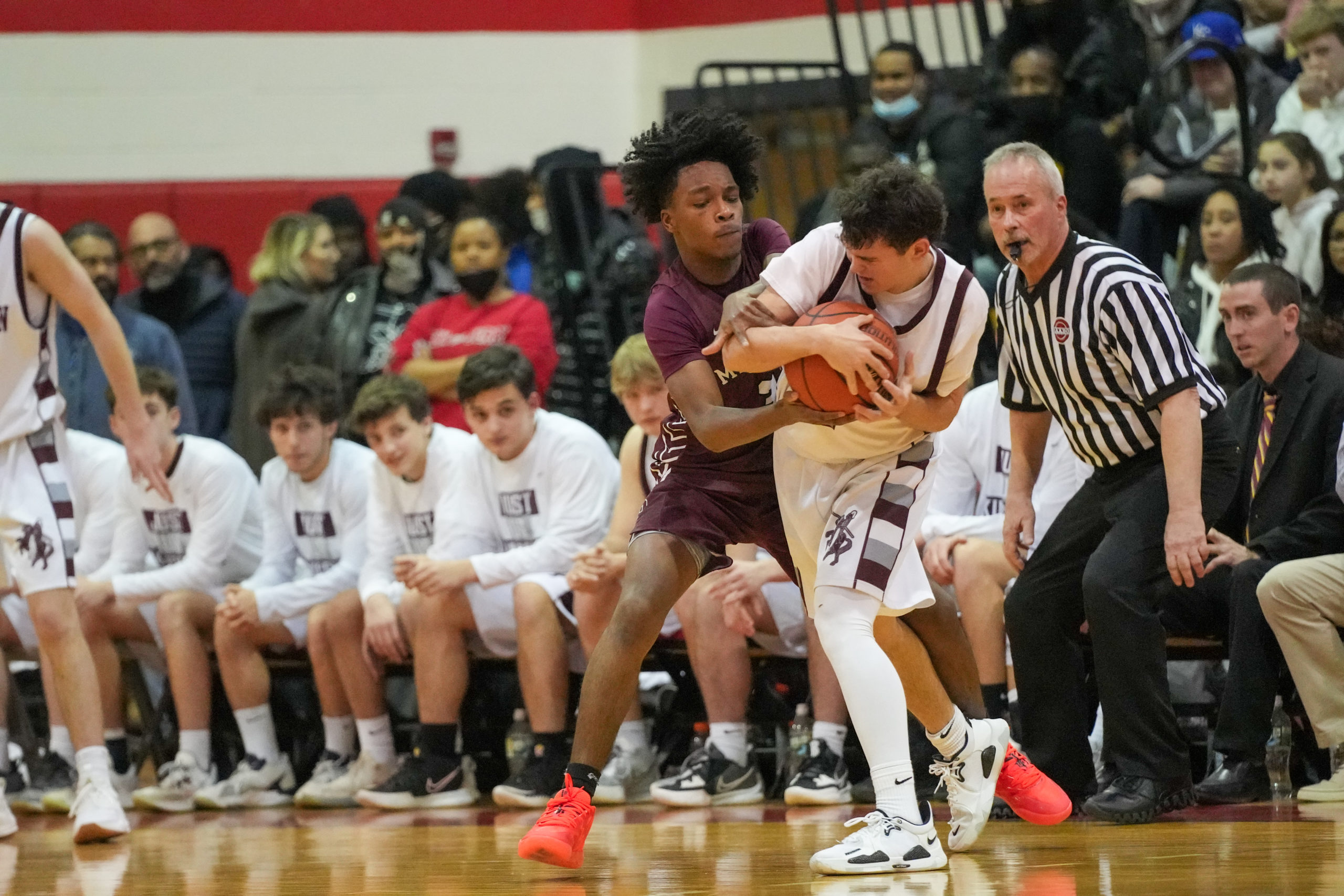 Southampton junior Derek Reed tries to force Kings Park senior Jon Borkowski to turn the ball over. RON ESPOSITO