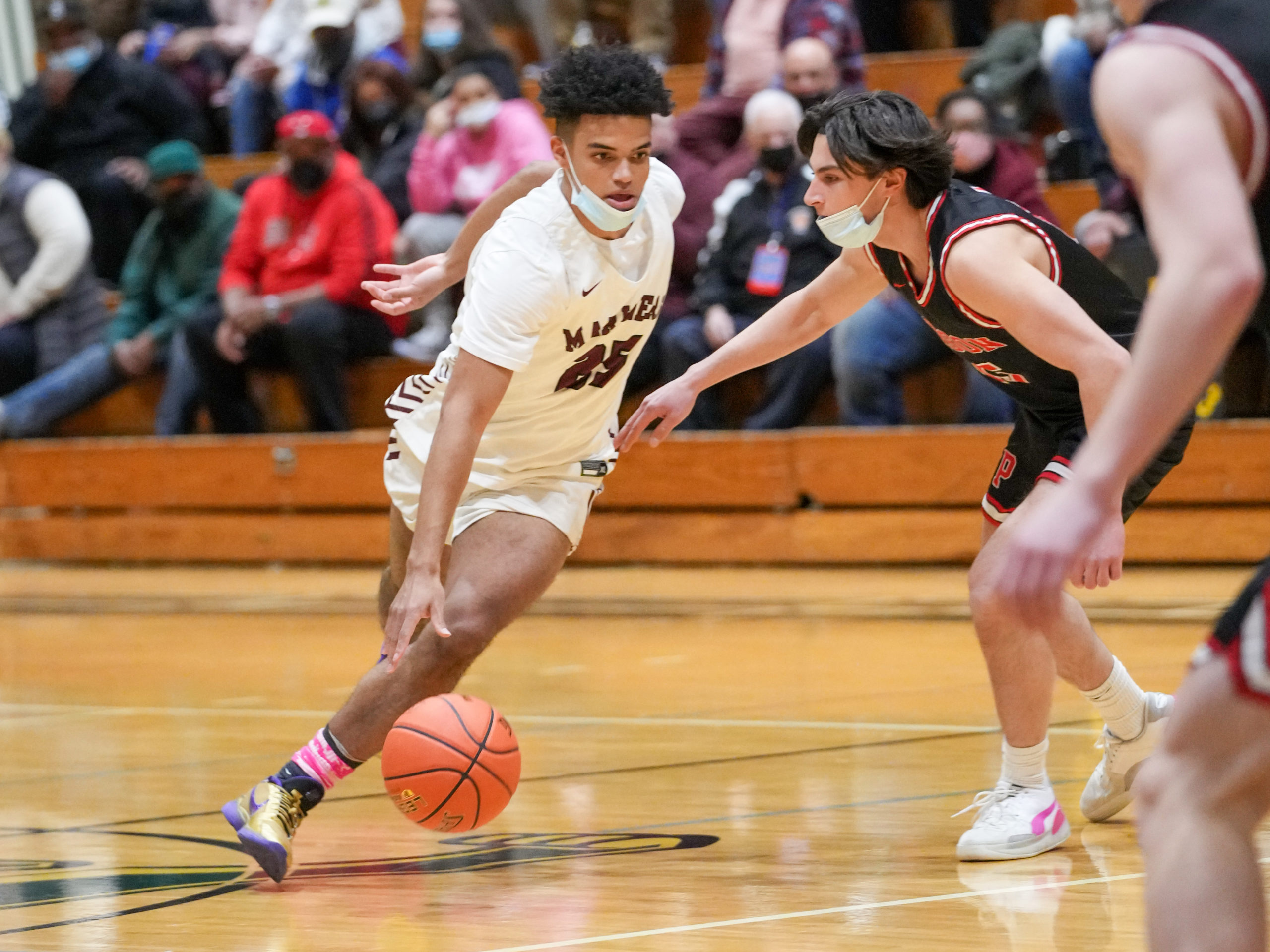 Southampton senior LeBron Napier drives on Pierson senior Leo Butler.   RON ESPOSITO