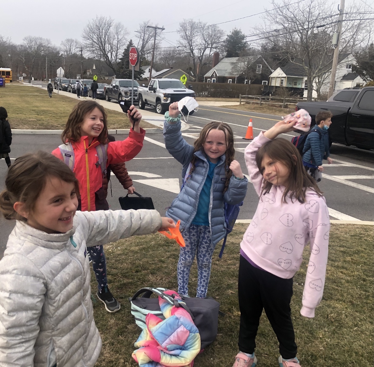 East Quogue School students celebrate during dismissal on Tuesday, which was the final day that masks would be mandatory in their school.