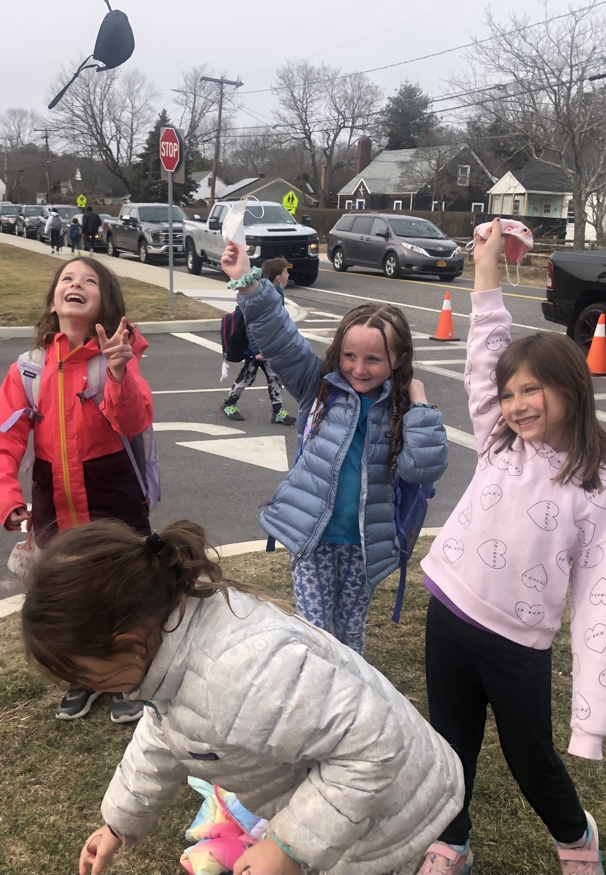 East Quogue School students celebrate during dismissal on Tuesday, which was the final day that masks would be mandatory in their school.