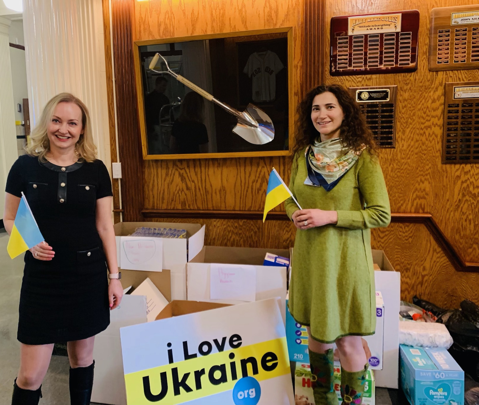 The Bridgehampton School National Junior Honor Society members, under adviser Maria Bouzos-Reilly, right, were instrumental in supporting the efforts of ILoveUkraine.org, founded by East End resident Natalie Massa, left, in response to the humanitarian disaster in the land of her birth, where her family and school friends are in need of basic necessities.