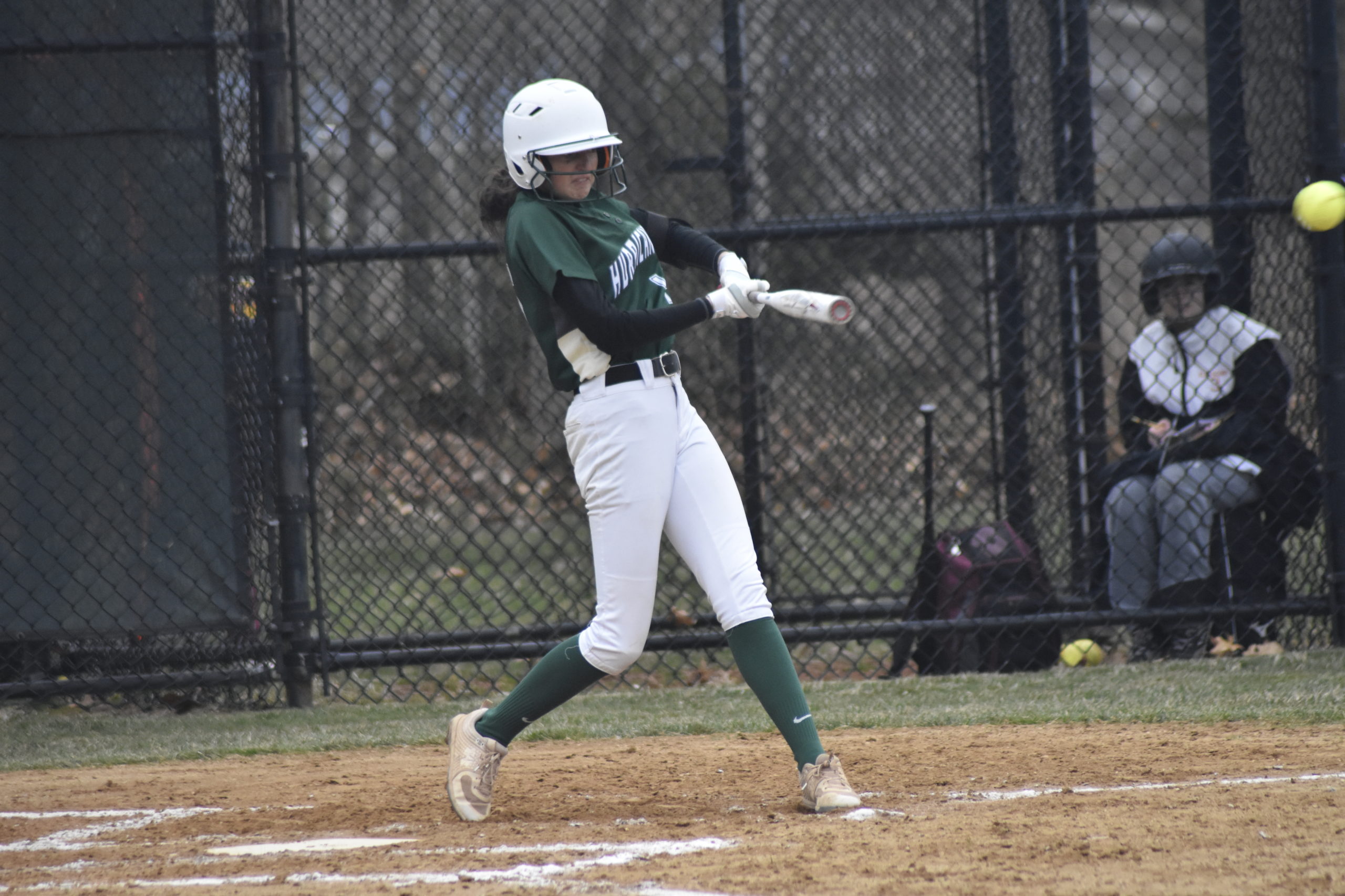 Westhampton Beach senior Allie Parascandola rips a double down the left field line that gets her team on the scoreboard.    DREW BUDD