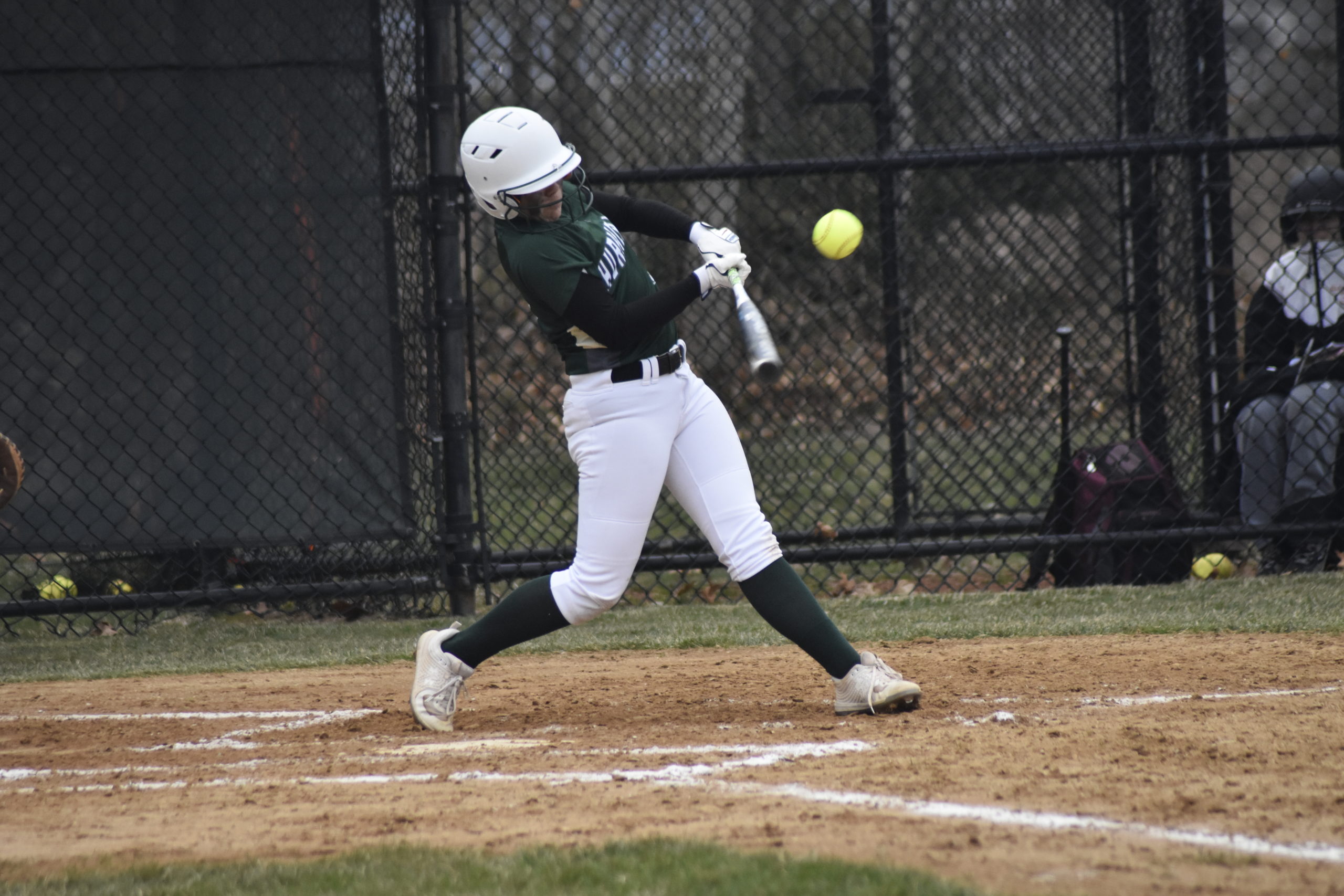 Addison Celi puts a ball in play for the Hurricanes.   DREW BUDD