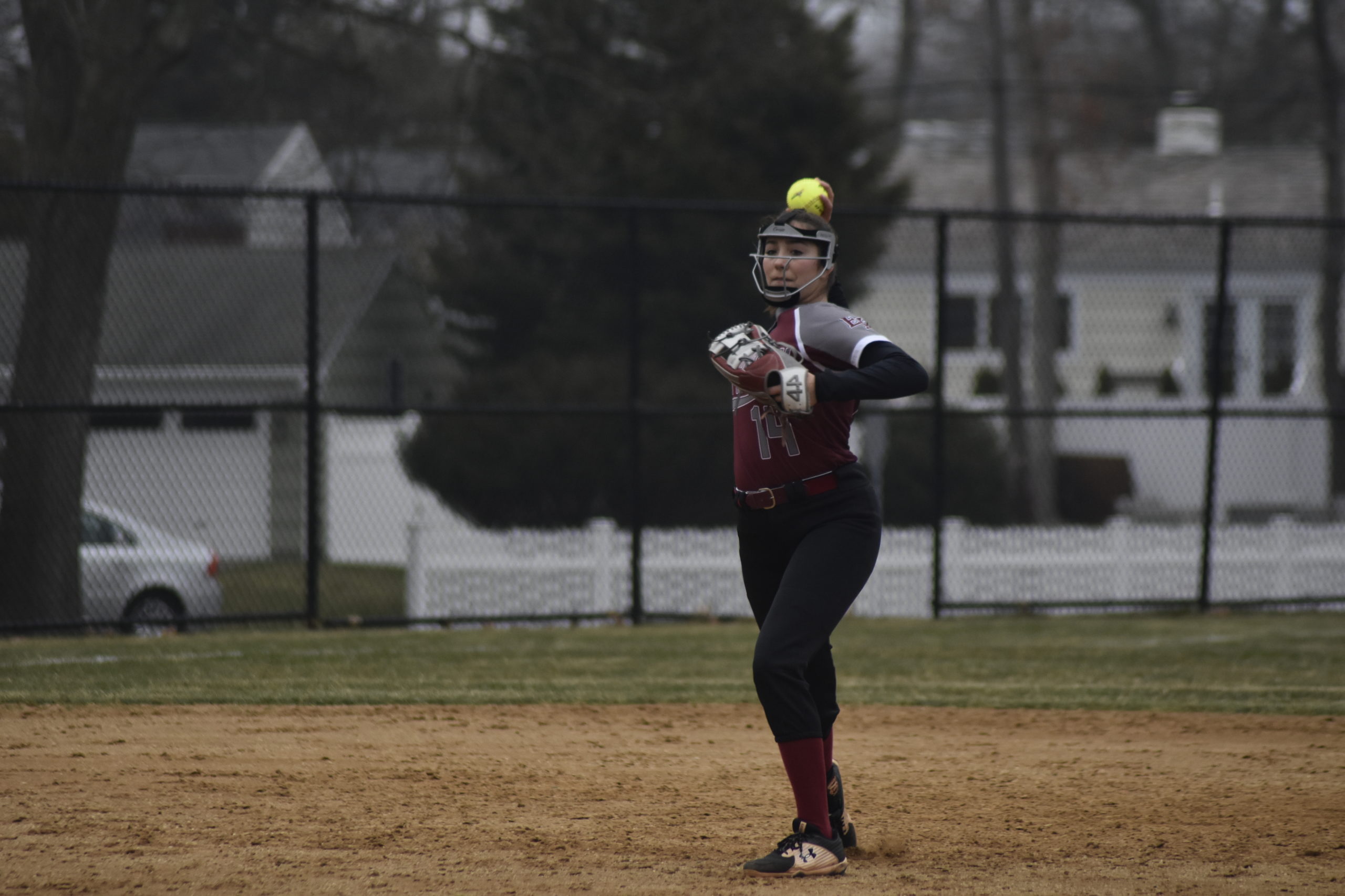 East Hampton shortstop Emma Terry throws to first for an out.  DREW BUDD