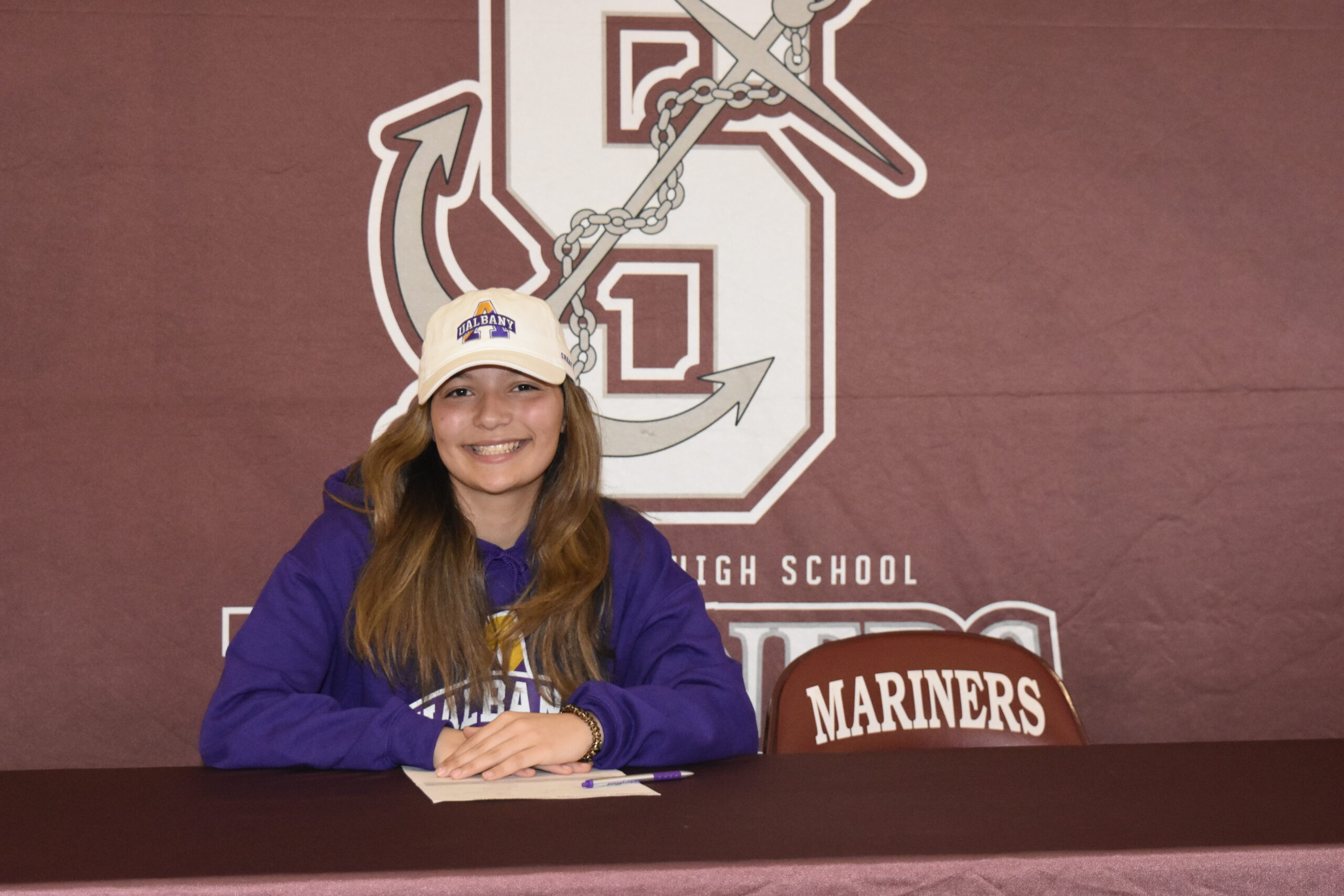 Gabriella Arnold signed her letter of intent to run track at the University of Albany on April 1.    DREW BUDD