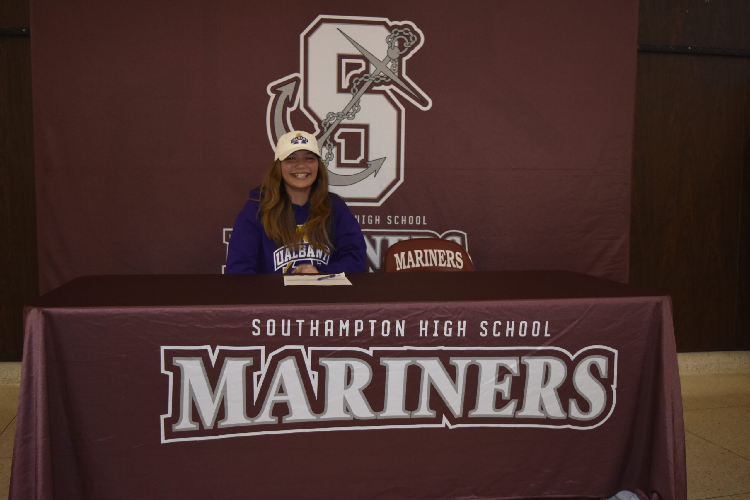 Gabriella Arnold signed her letter of intent to run track at the University of Albany on April 1.    DREW BUDD