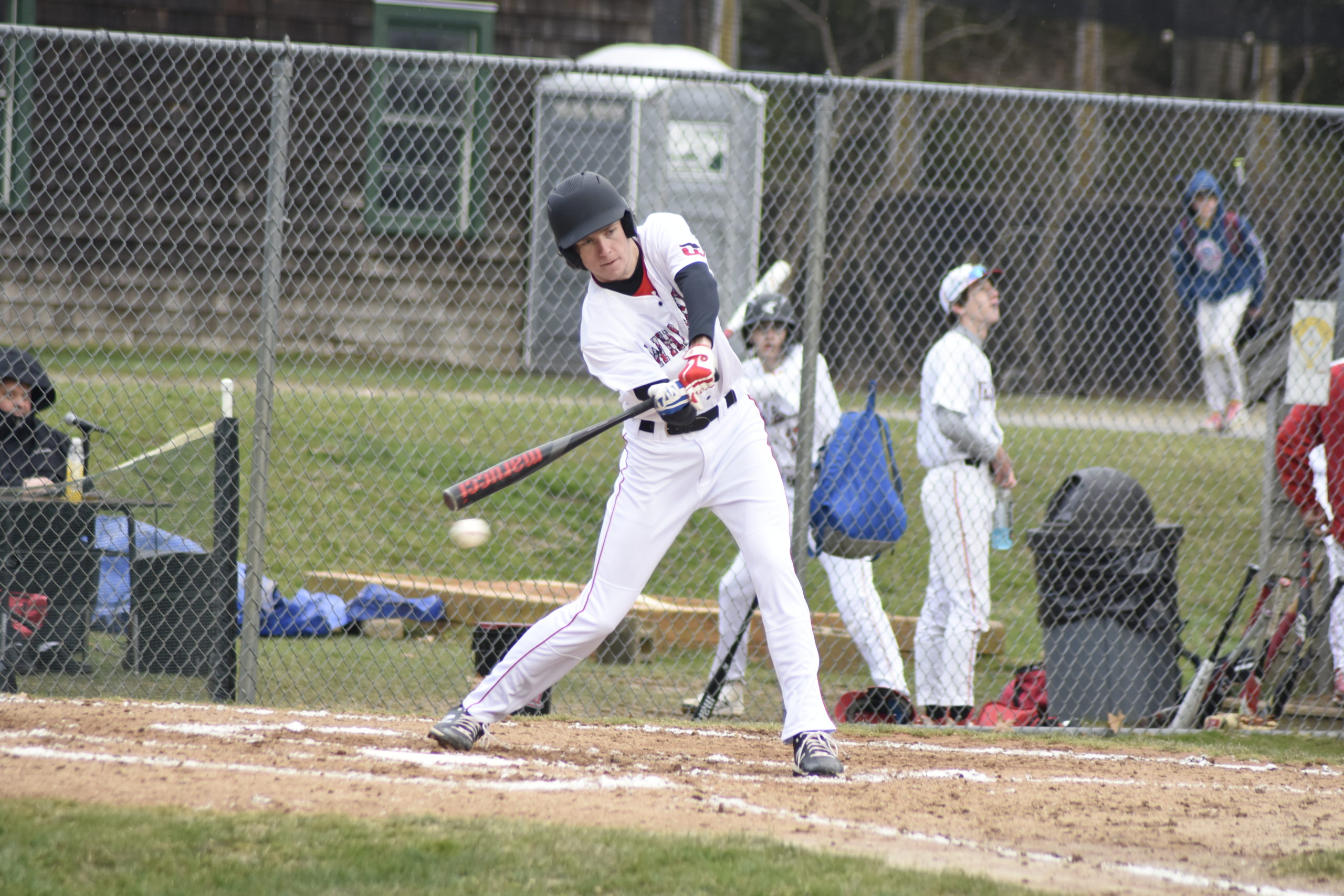 Pierson senior Charlie Culver holds up on a called ball.    DREW BUDD