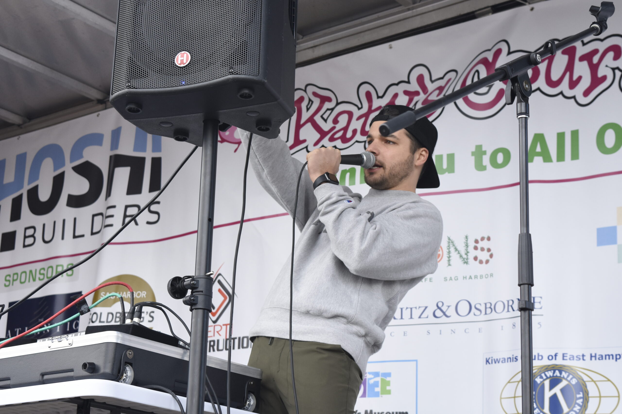 DJ  gets the crowd ready on Saturday morning.   DREW BUDD