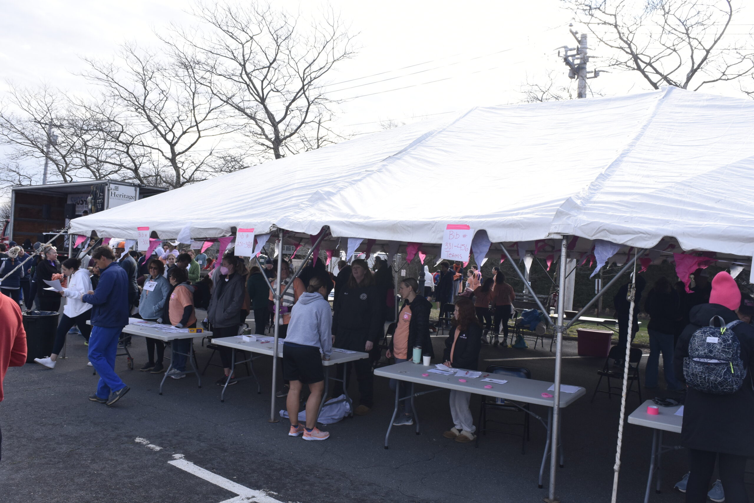 Volunteers help out with anything from handing out race bibs to some breakfast.    DREW BUDD