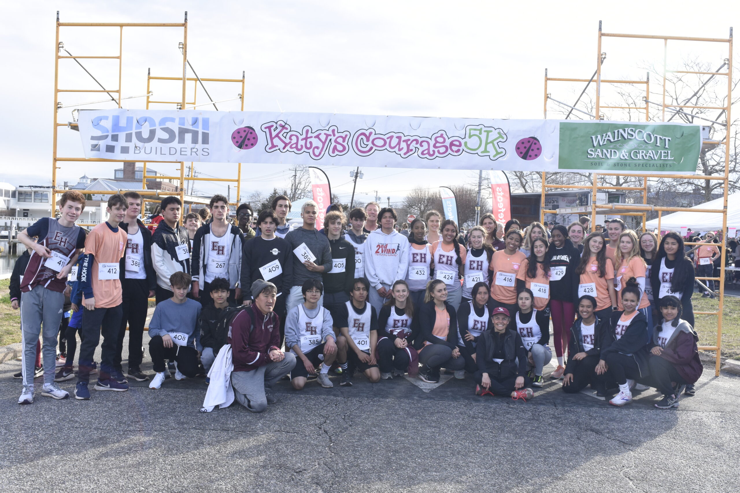 The East Hampton boys and girls track teams were one of many local teams on hand participating in Saturday's race.    DREW BUDD