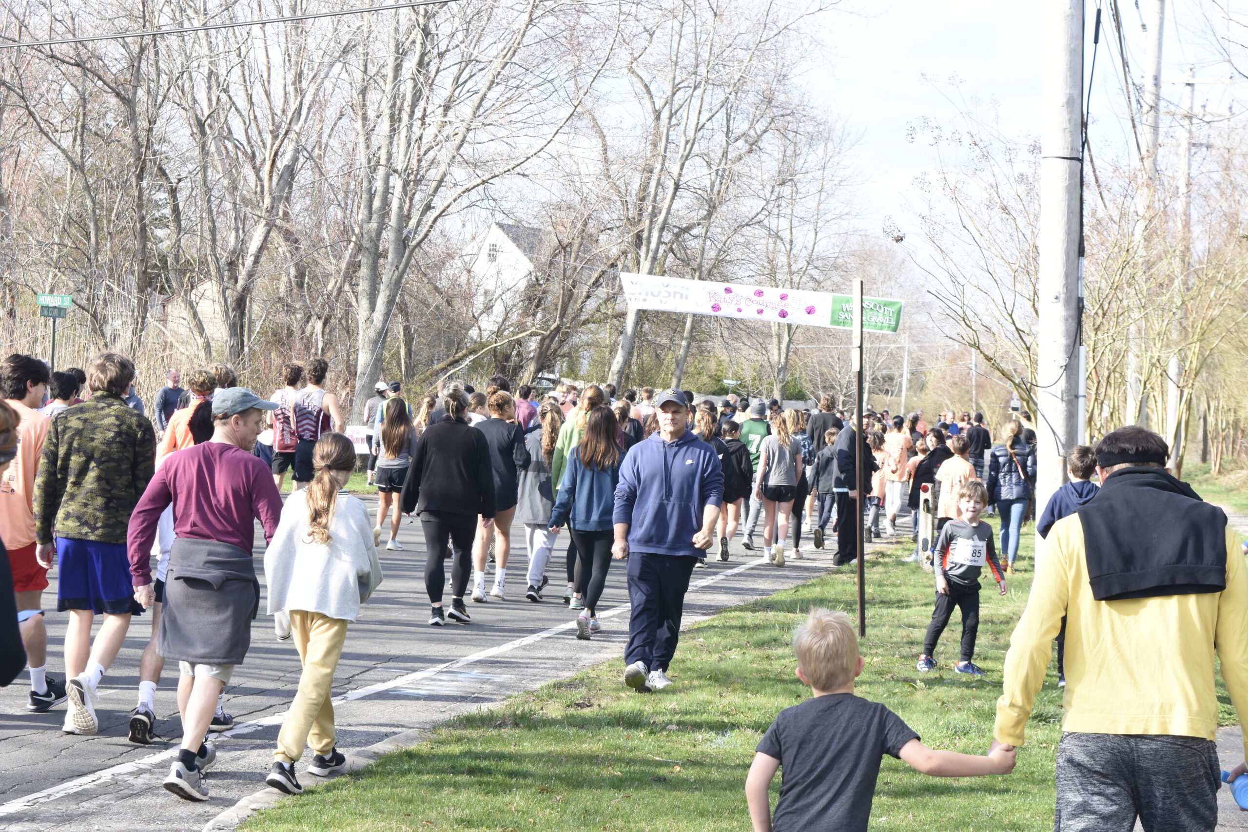 Participants head to the starting line on Water Street.   DREW BUDD