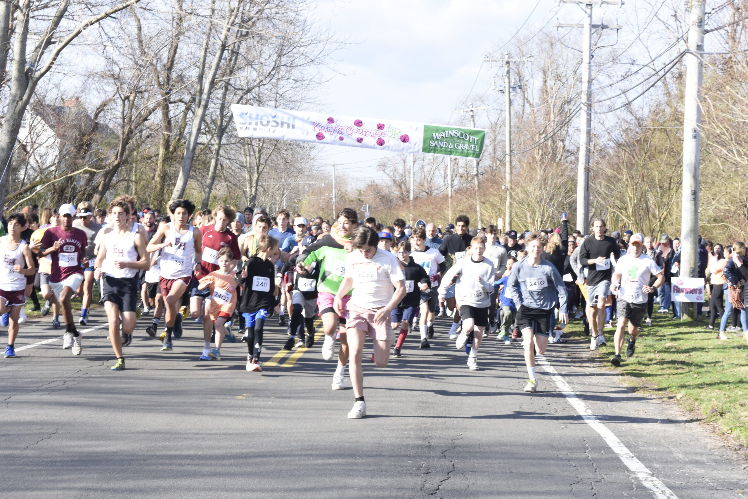 Runners start the 10th annual Katy's Courage 5K in Sag Harbor on Saturday.    DREW BUDD