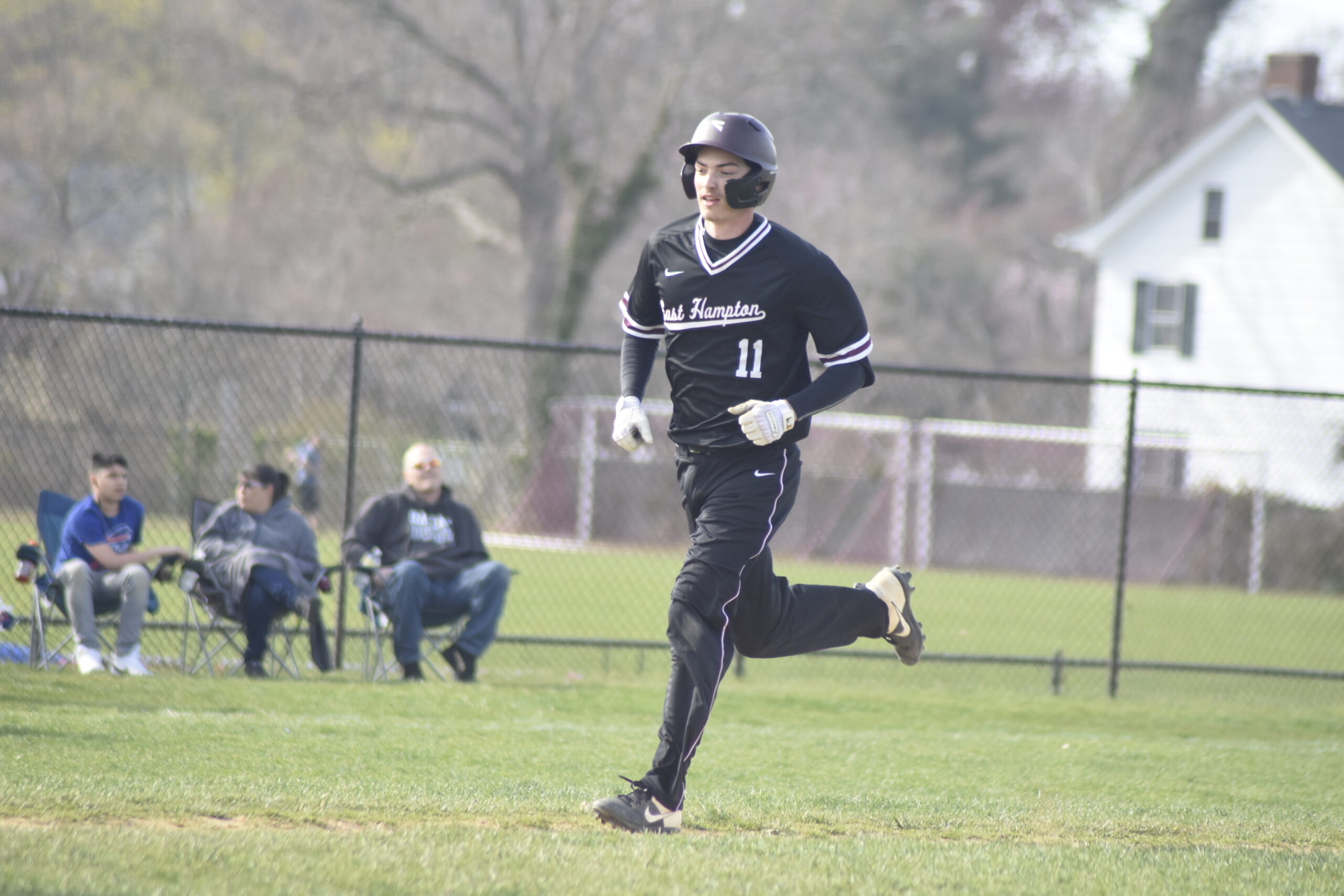 Avery Siska heads to home plate on his grand slam.   DREW BUDD